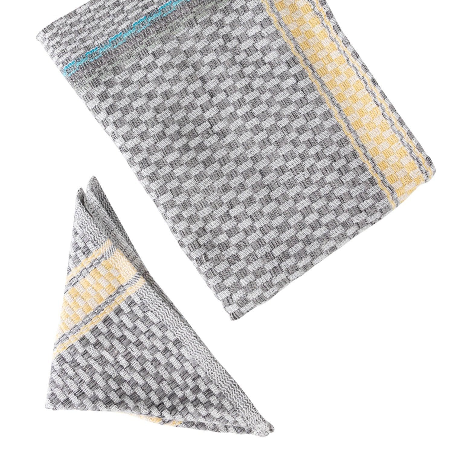 Close-up of handmade kitchen towels in vibrant colors, ideal for any kitchen decor.