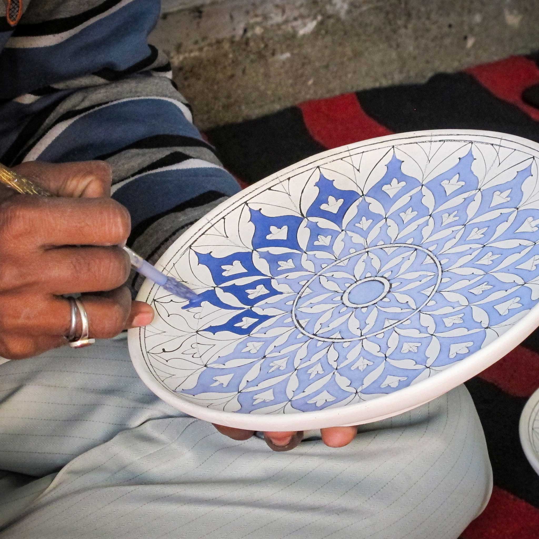 Side view showing the detailed handcrafting and vibrant colors