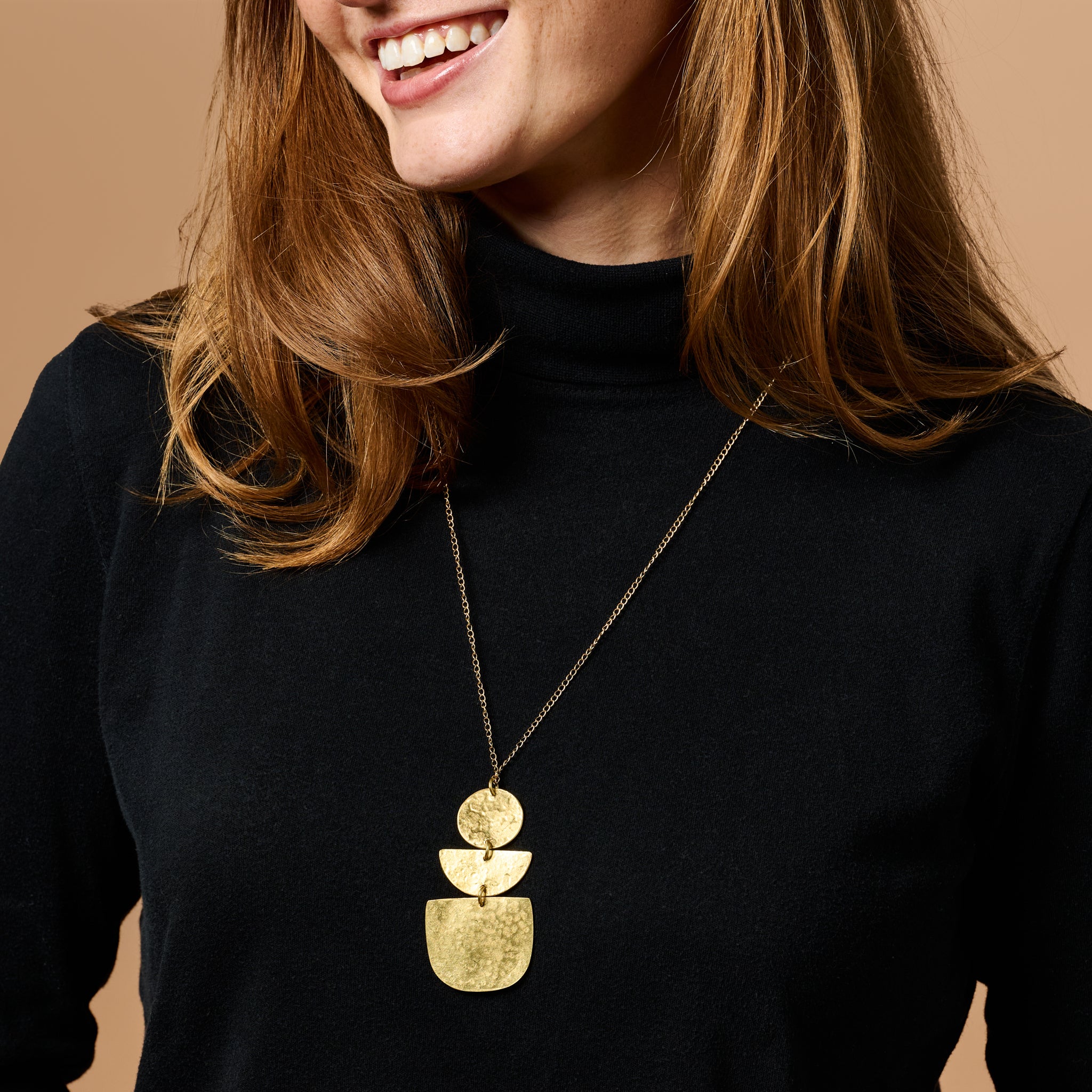 Tatu Geometric Statement Necklace showcasing its unique design and craftsmanship.