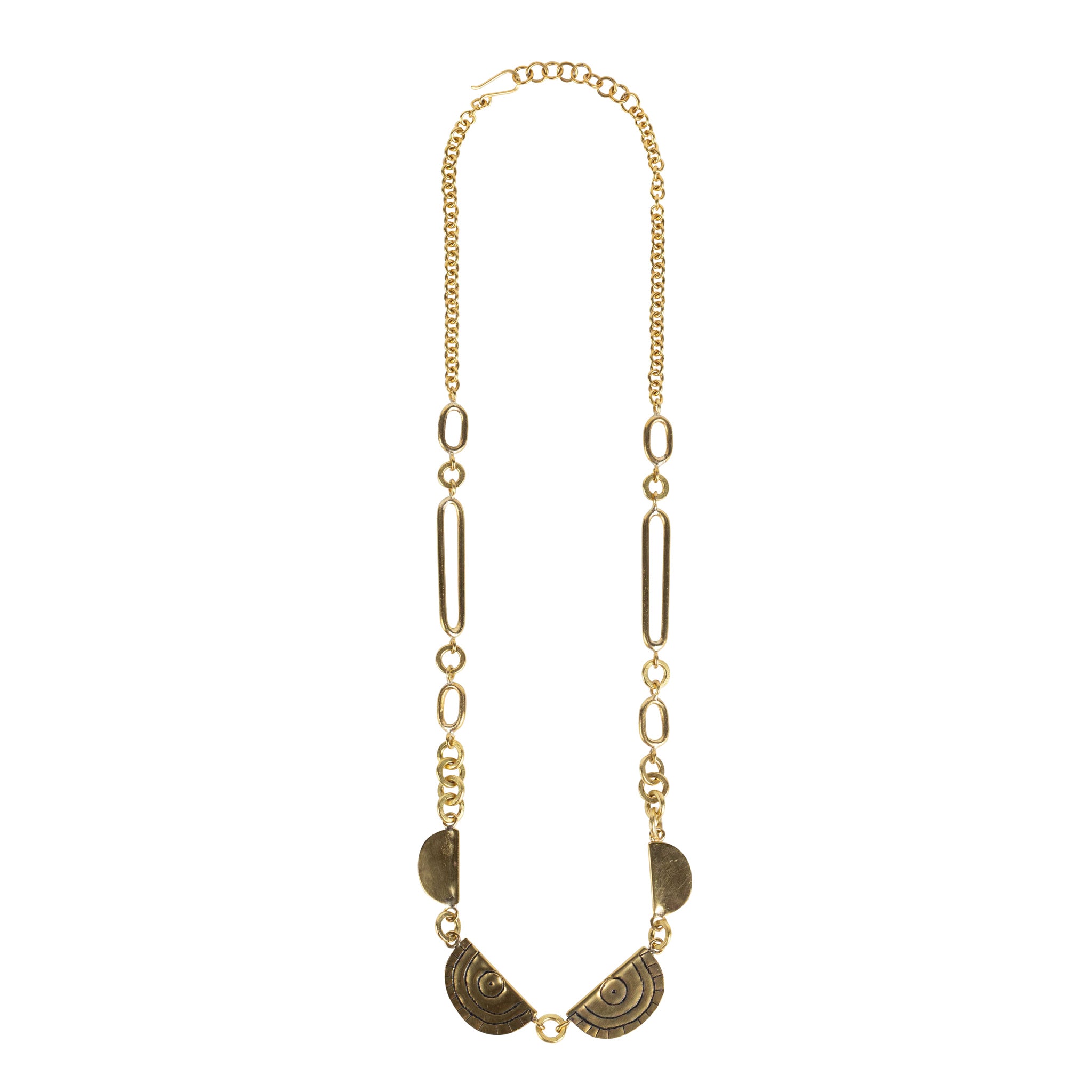 Handcrafted brass statement necklace from Kenya showcasing etching details