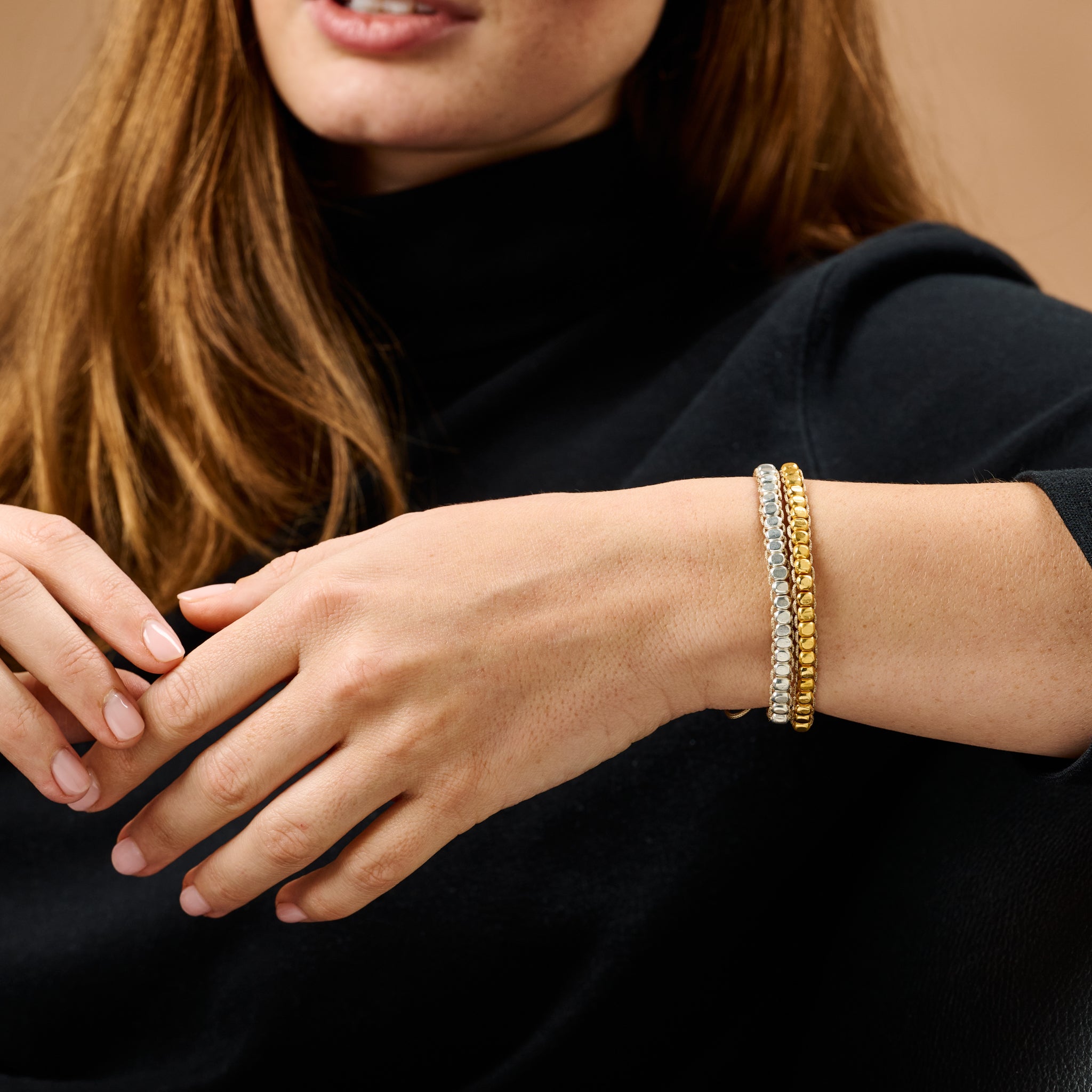 Colorful handmade friendship bracelets worn on wrist, perfect for gifts