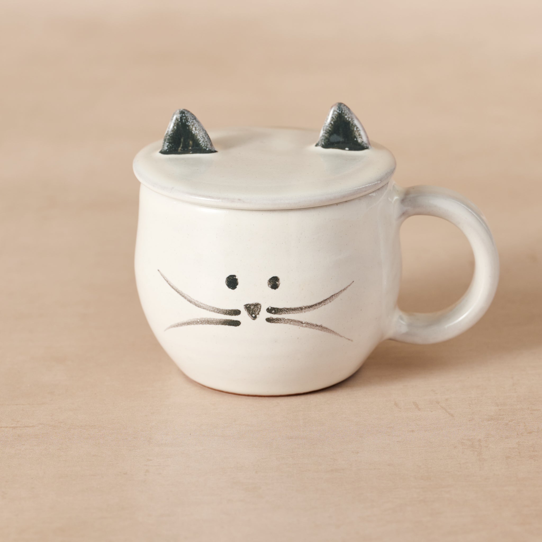 Purrfect tea steeping mug with kitty ears, perfect for cat lovers