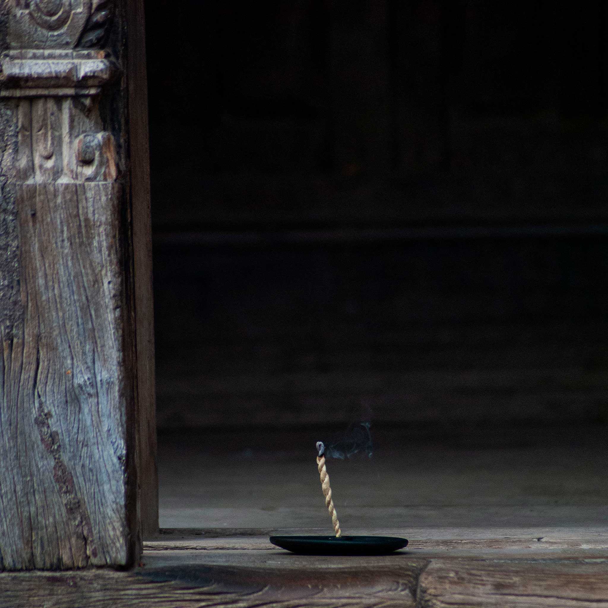 All included blends of rope incense laid out beside handmade black clay holder