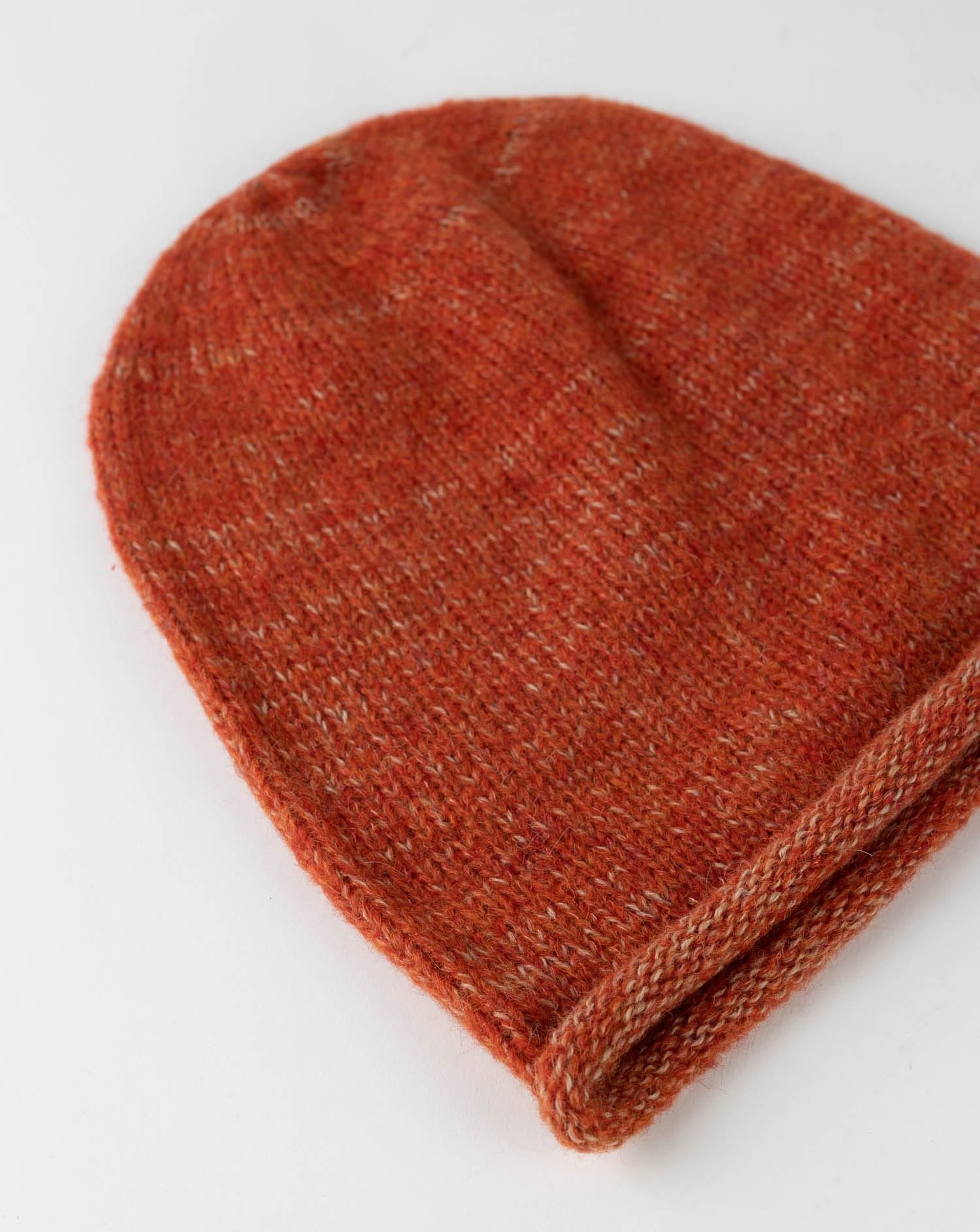 Close-up of the chic alpaca wool slouchy beanie showcasing its boucle texture.