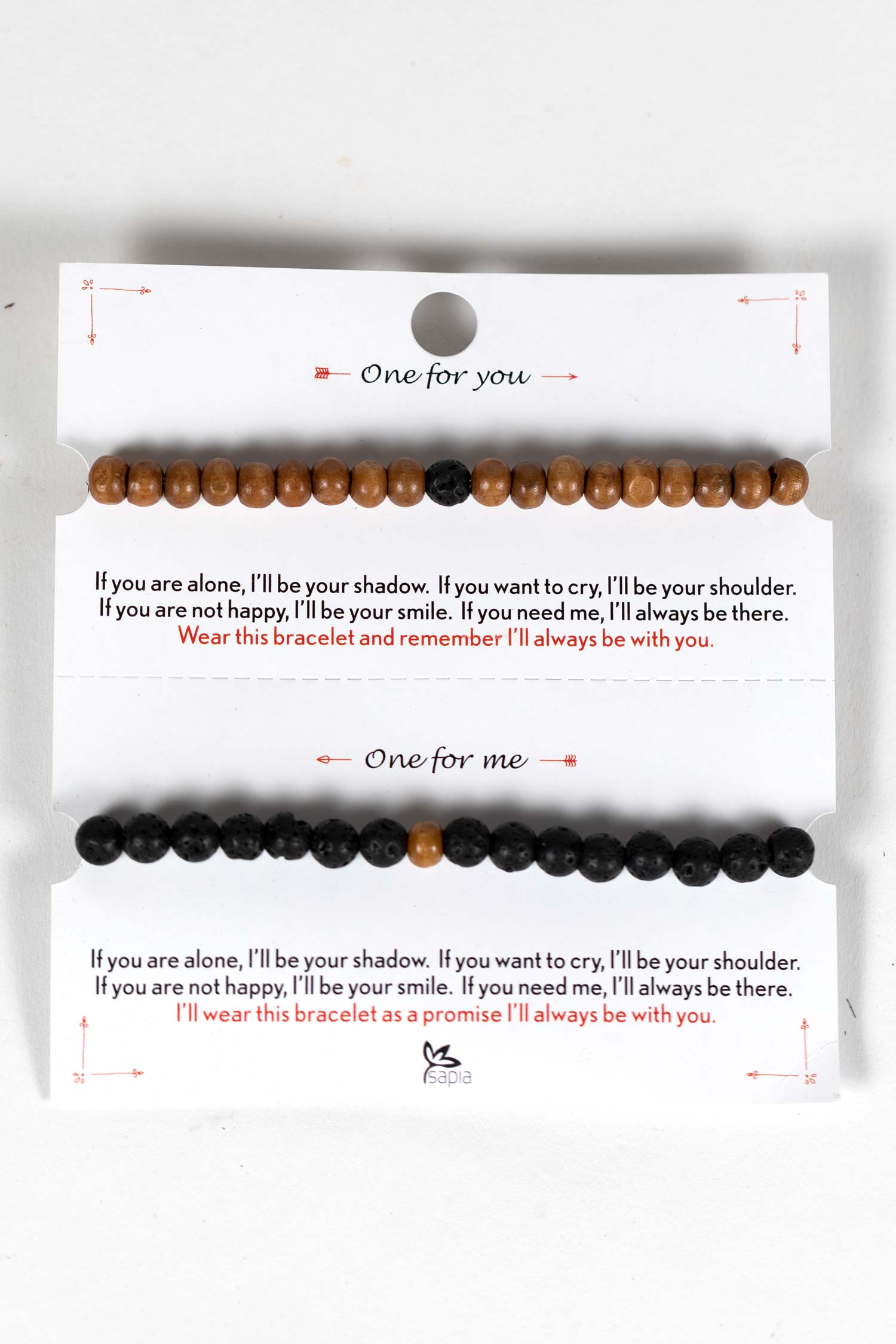 Close-up of the Connected Hearts Artisan Bracelet Set, displaying the intricate craftsmanship and natural materials.