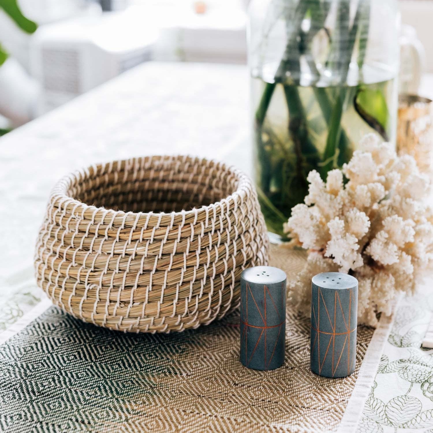 Kaisa woven storage bowl showcasing intricate handwoven details.