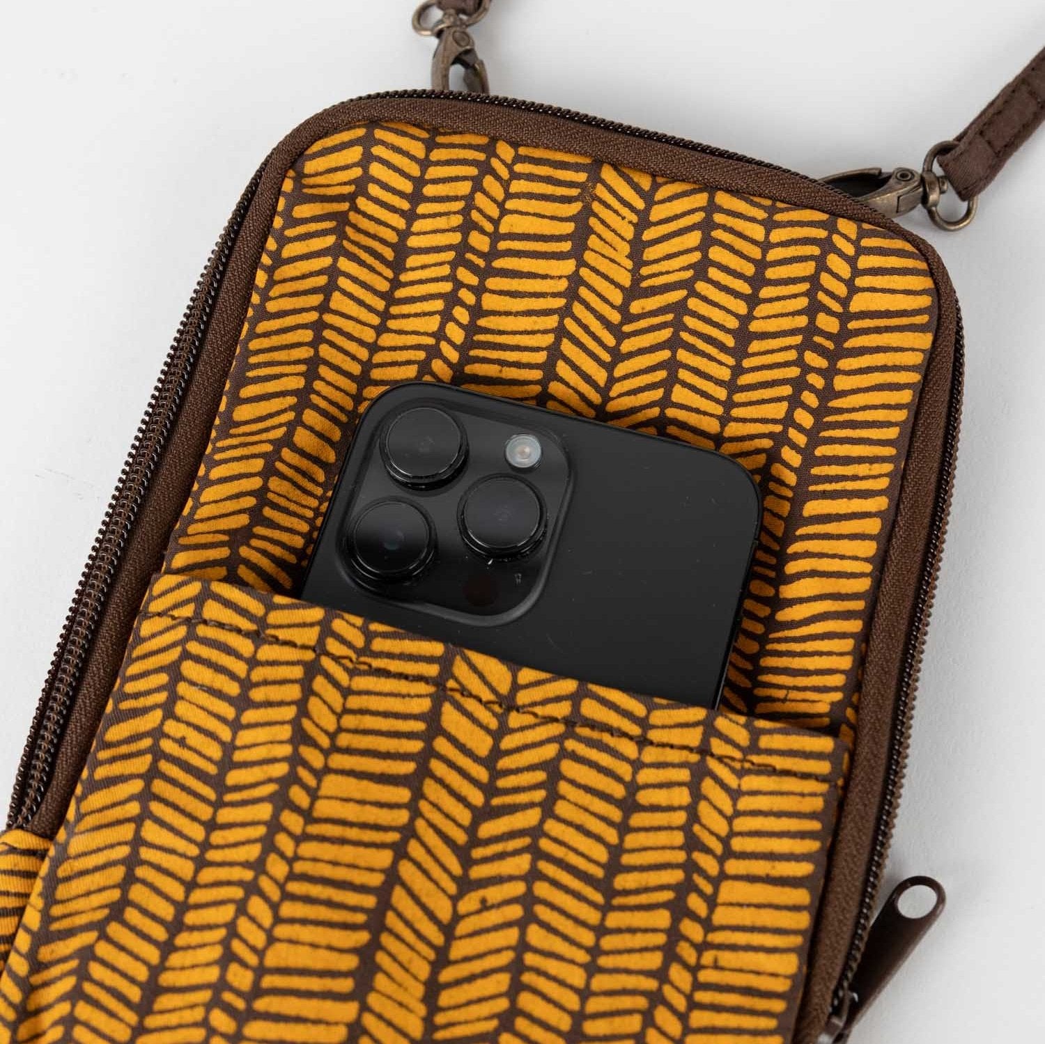 Open view showing interior slip pockets of handcrafted eco-conscious purse