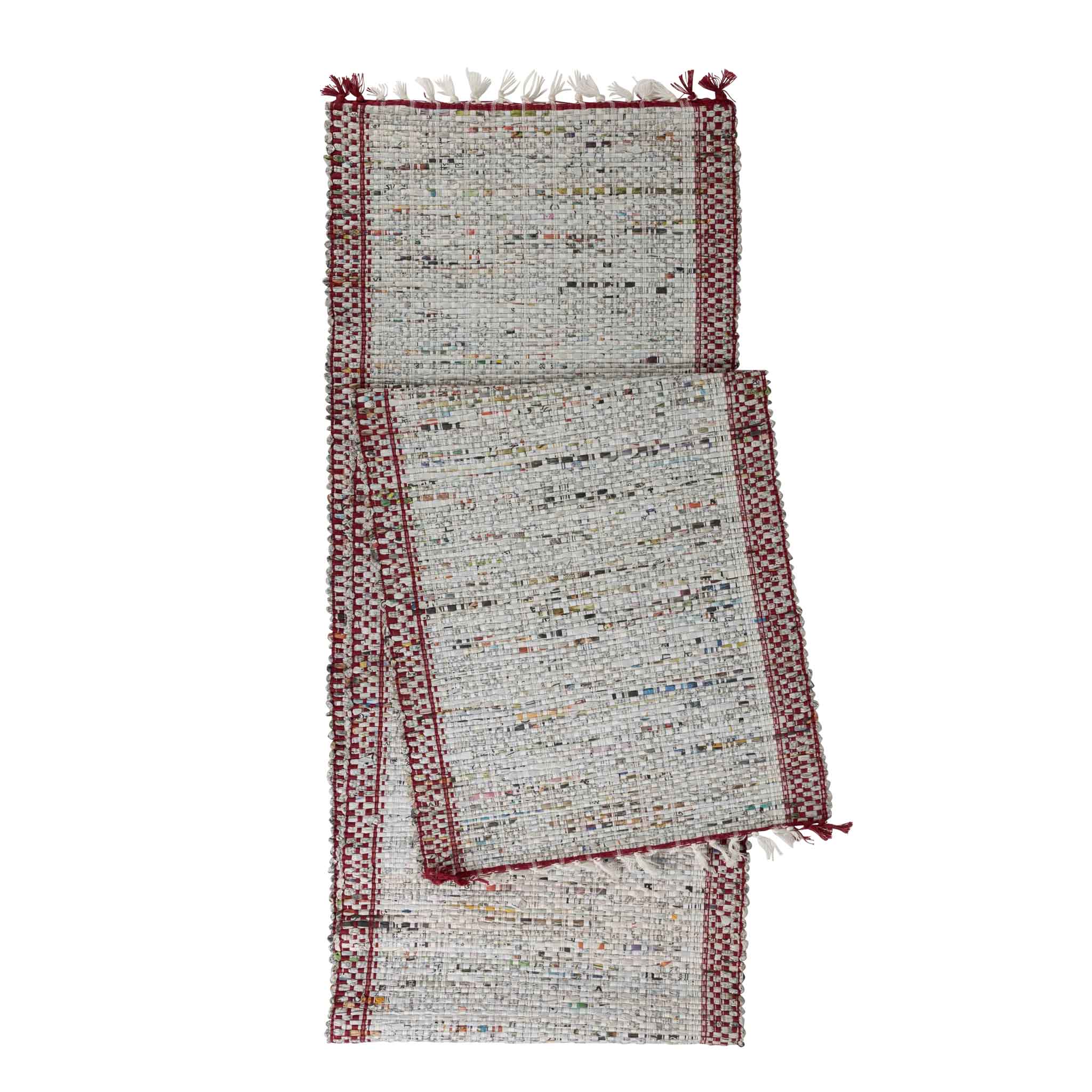 Eco-friendly handwoven table runner displayed on a dining table, showcasing its unique texture and design.