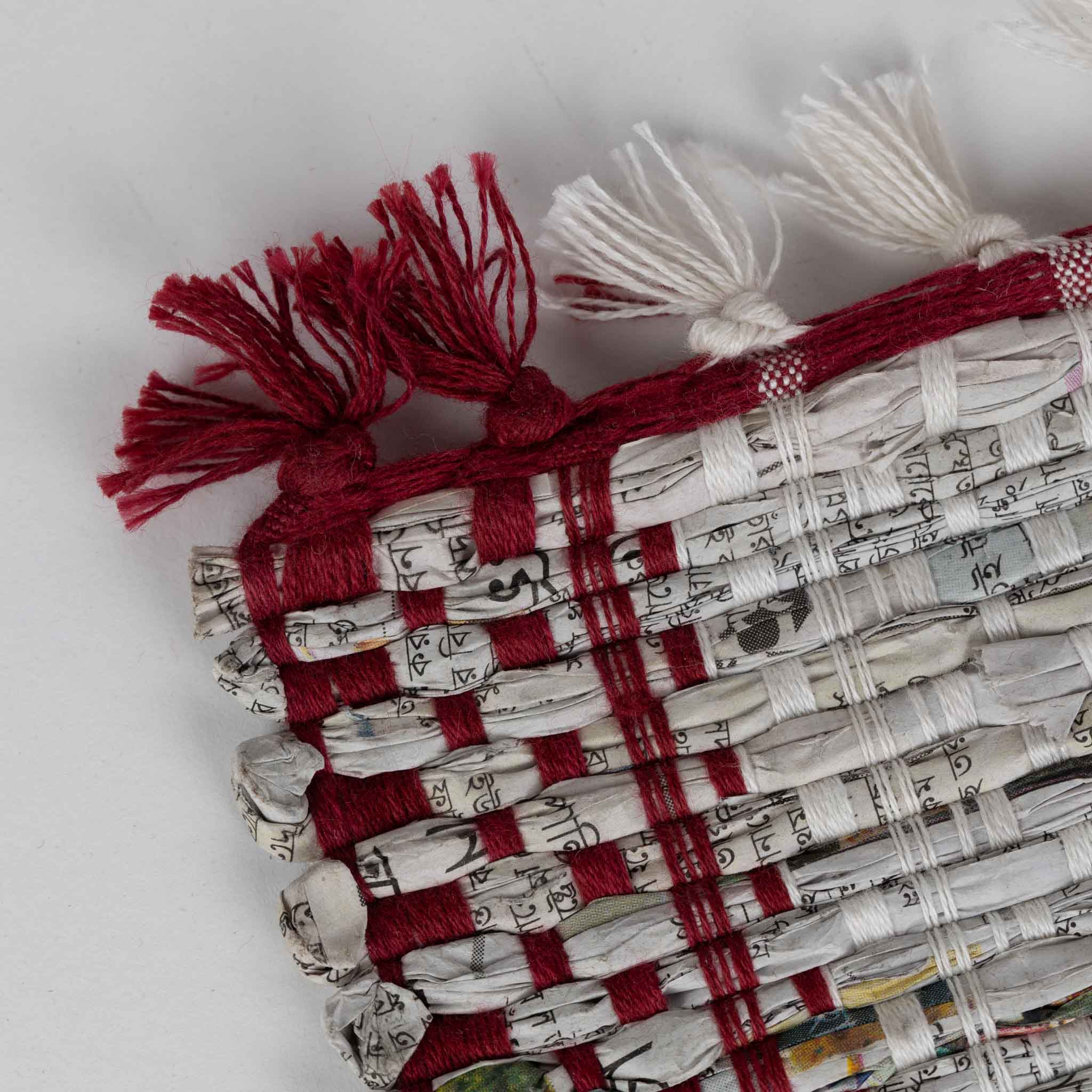 Eco-friendly handwoven table runner displayed on a dining table, showcasing its unique texture and design.