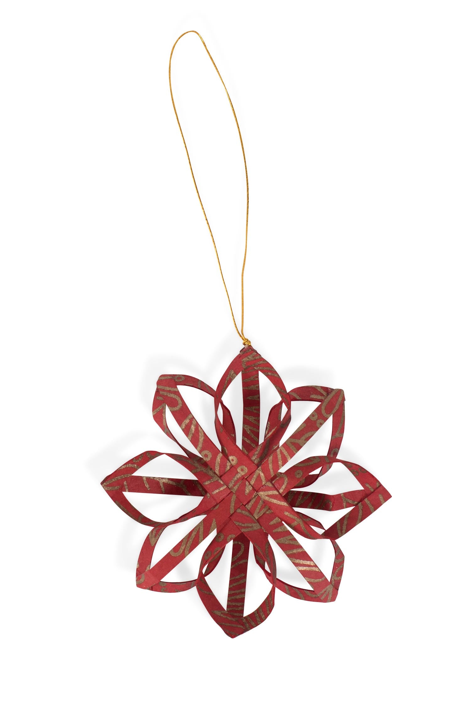 Elegant gold star ornament sitting on a festive table setting, showcasing its versatility.