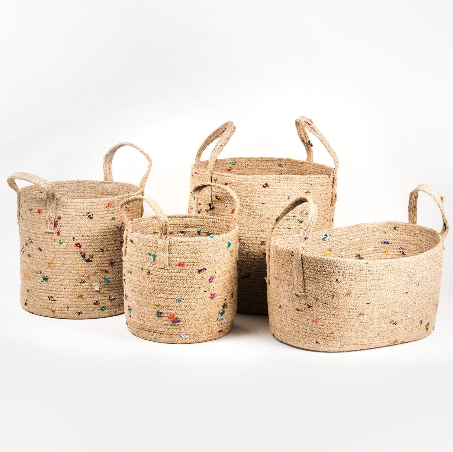 Vibrant jute basket in a cozy entryway, showcasing colorful sari fabric.