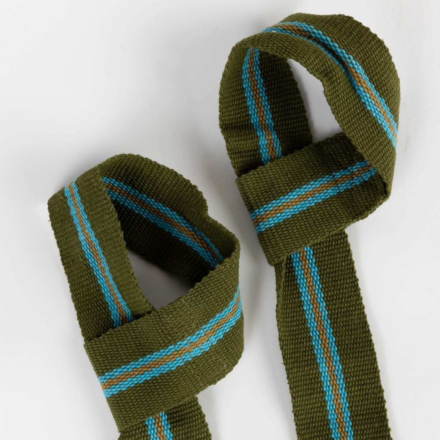 Yoga accessories including a stretching strap for enhanced flexibility in a yoga studio
