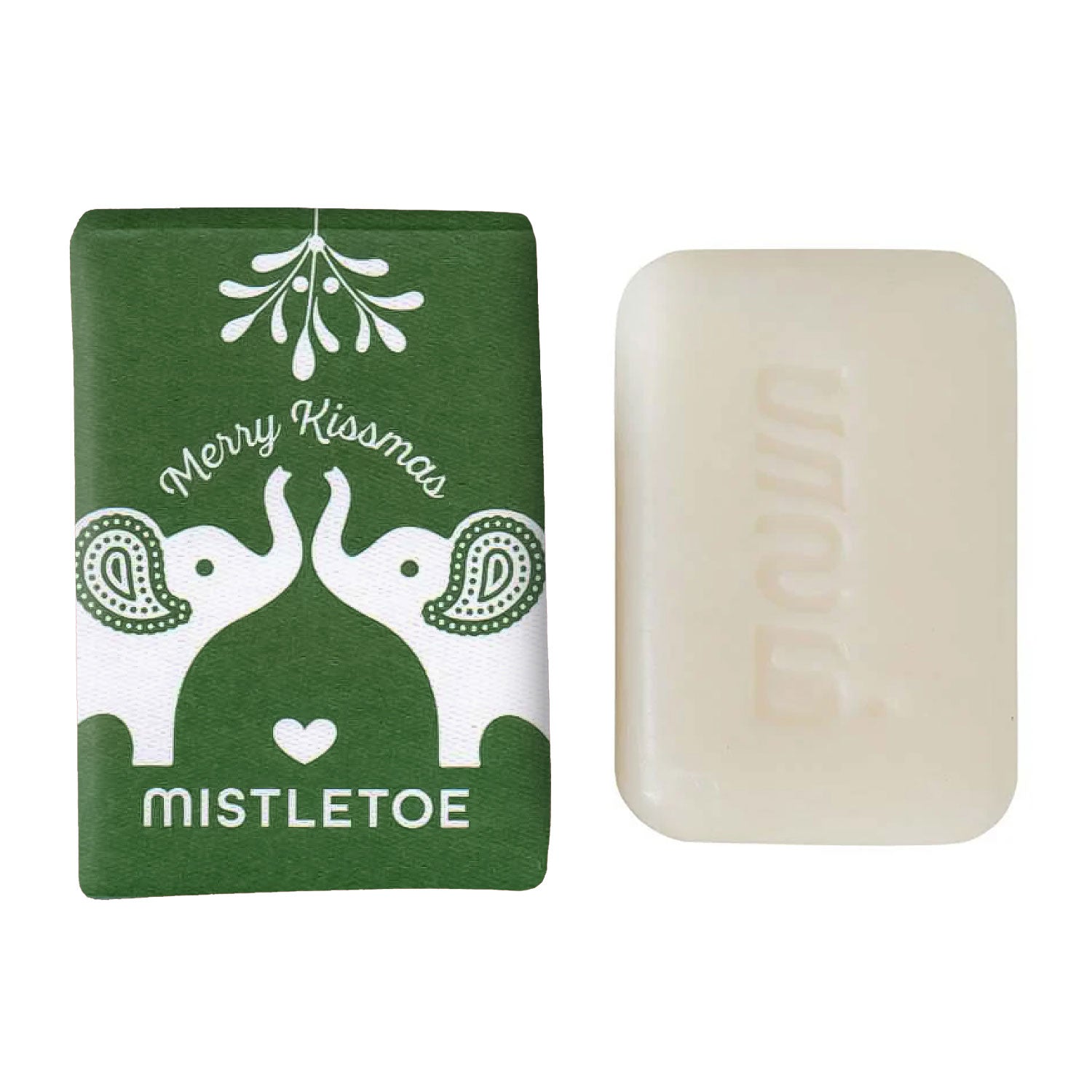 Close-up of luxury mistletoe soap with eucalyptus scent on a rustic wooden background.
