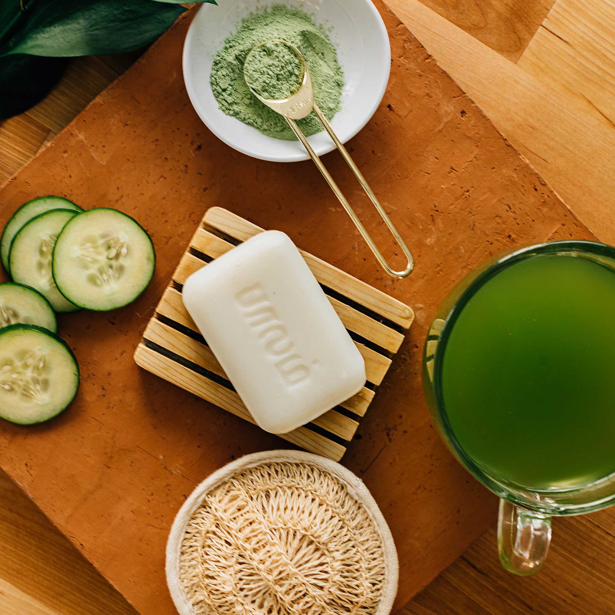 Vegan green tea soap bar on a wooden surface, ideal for sensitive skin