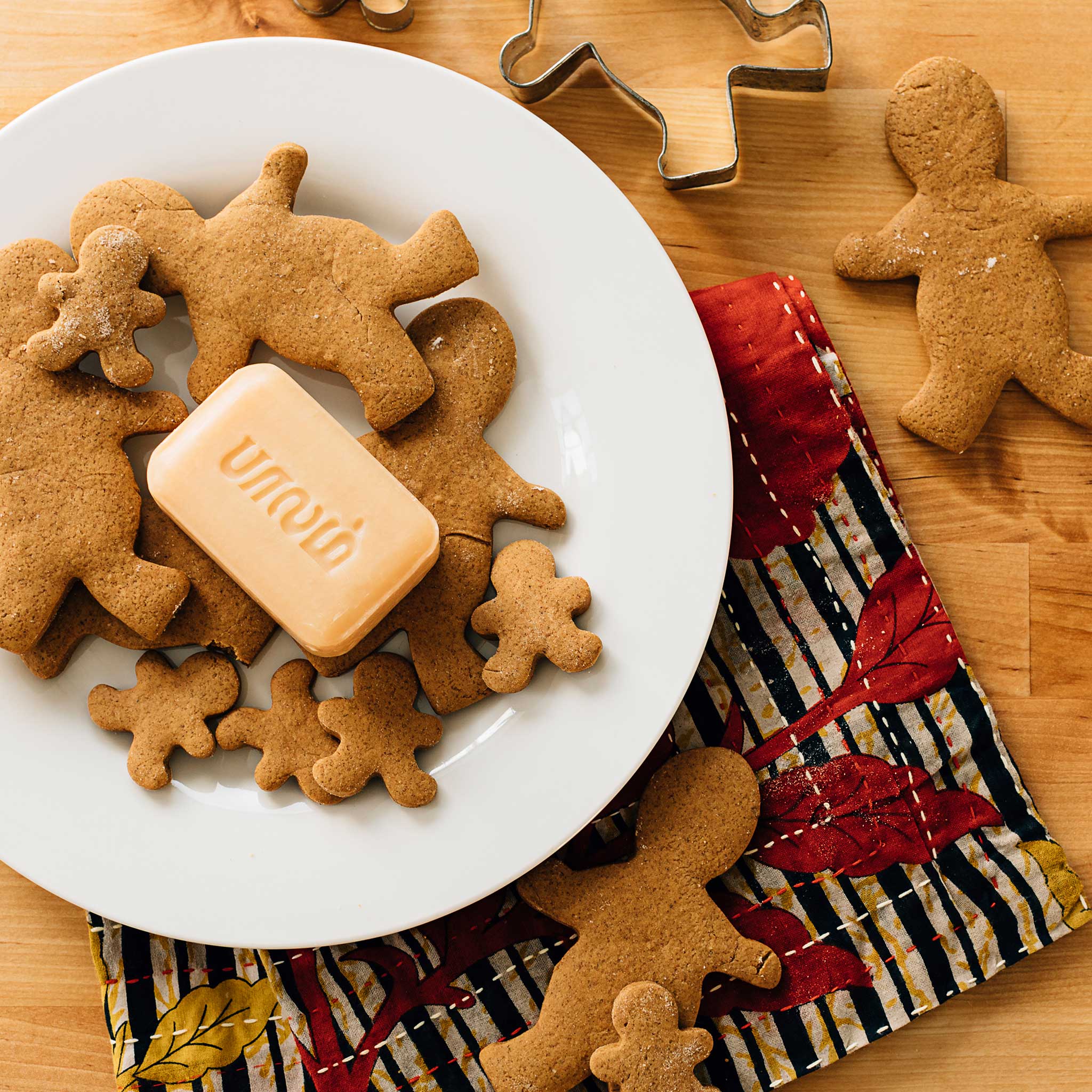 Ginger soap bar with festive holiday packaging, ideal as a gift