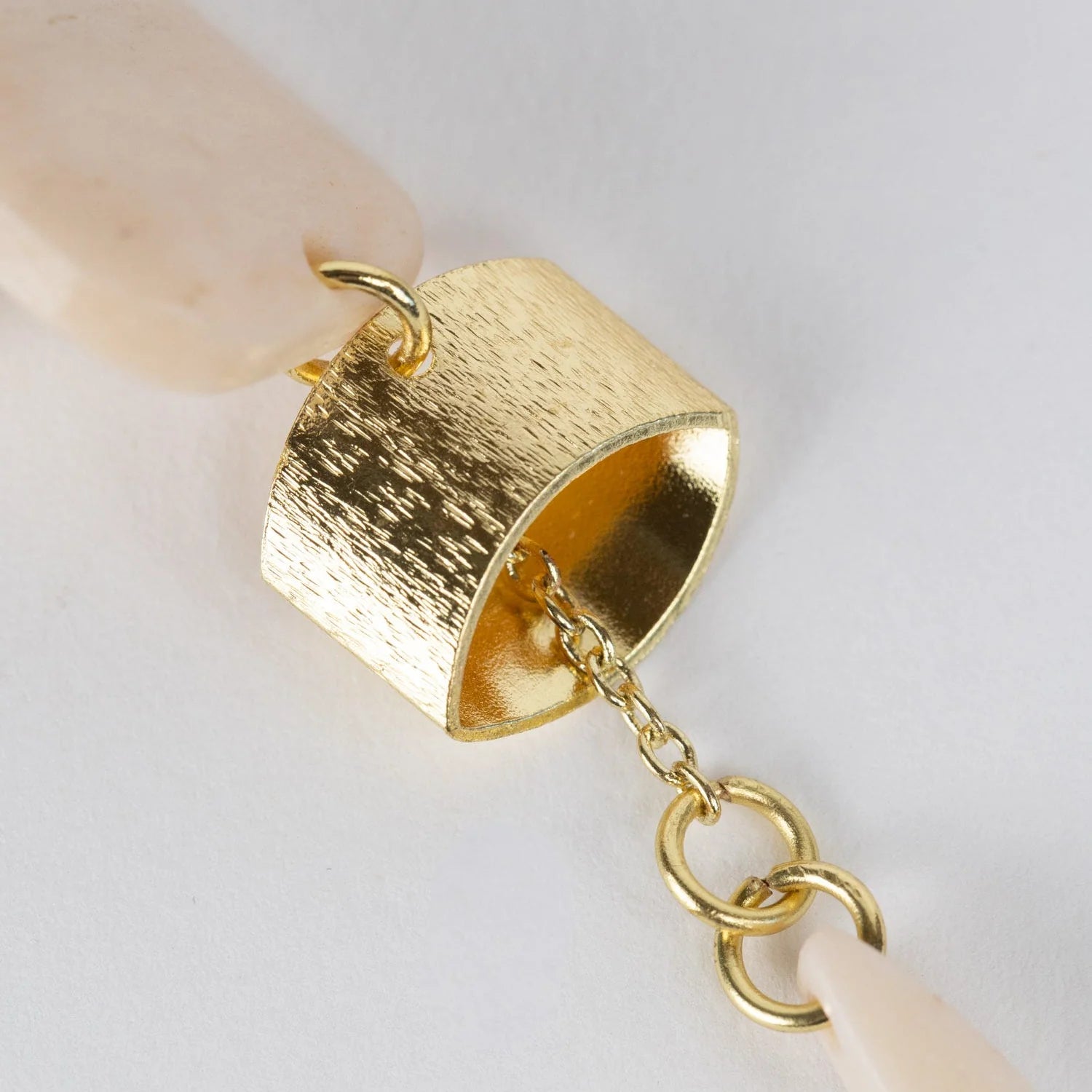 Elegant reclaimed bone dangle earrings showcasing unique artisan craftsmanship.