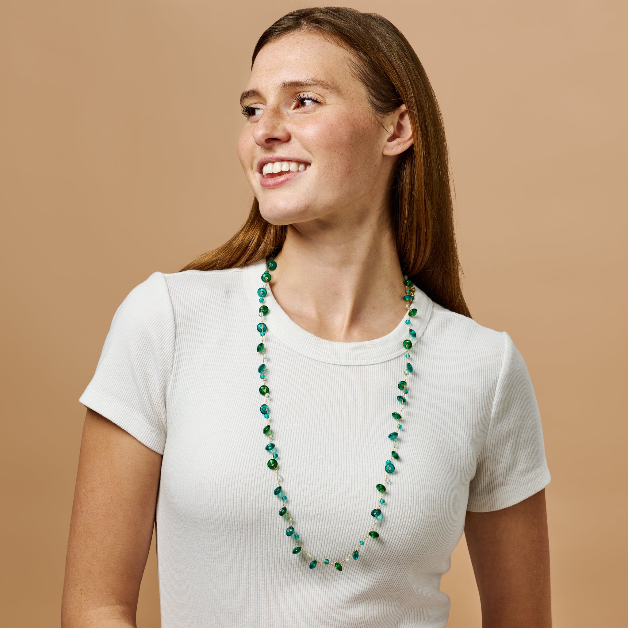 Close-up of Aqua Serenity Freshwater Pearl Necklace with aqua glass beads, perfect for any occasion.