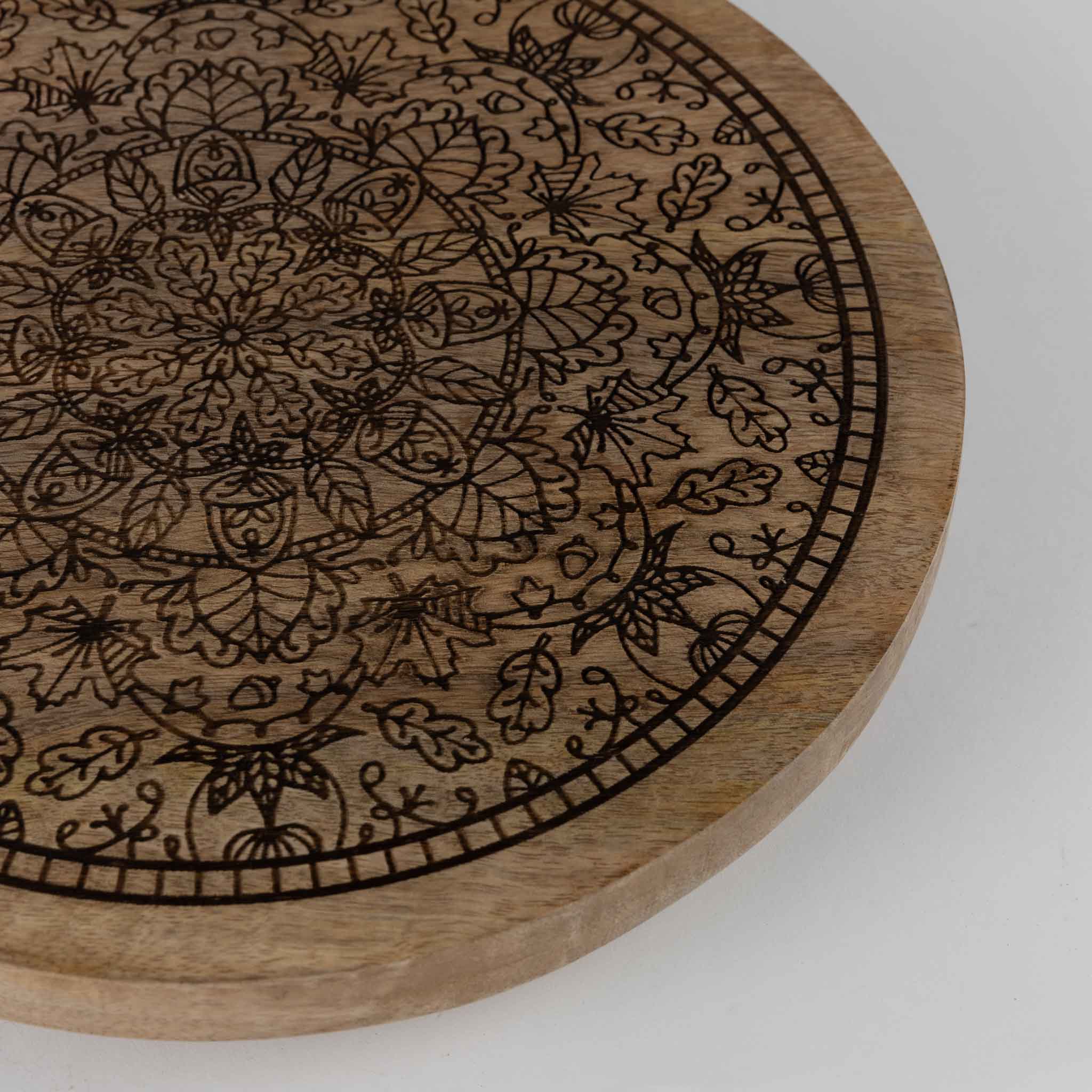 Top view of the wood lazy susan showcasing the detailed mandala centerpiece design