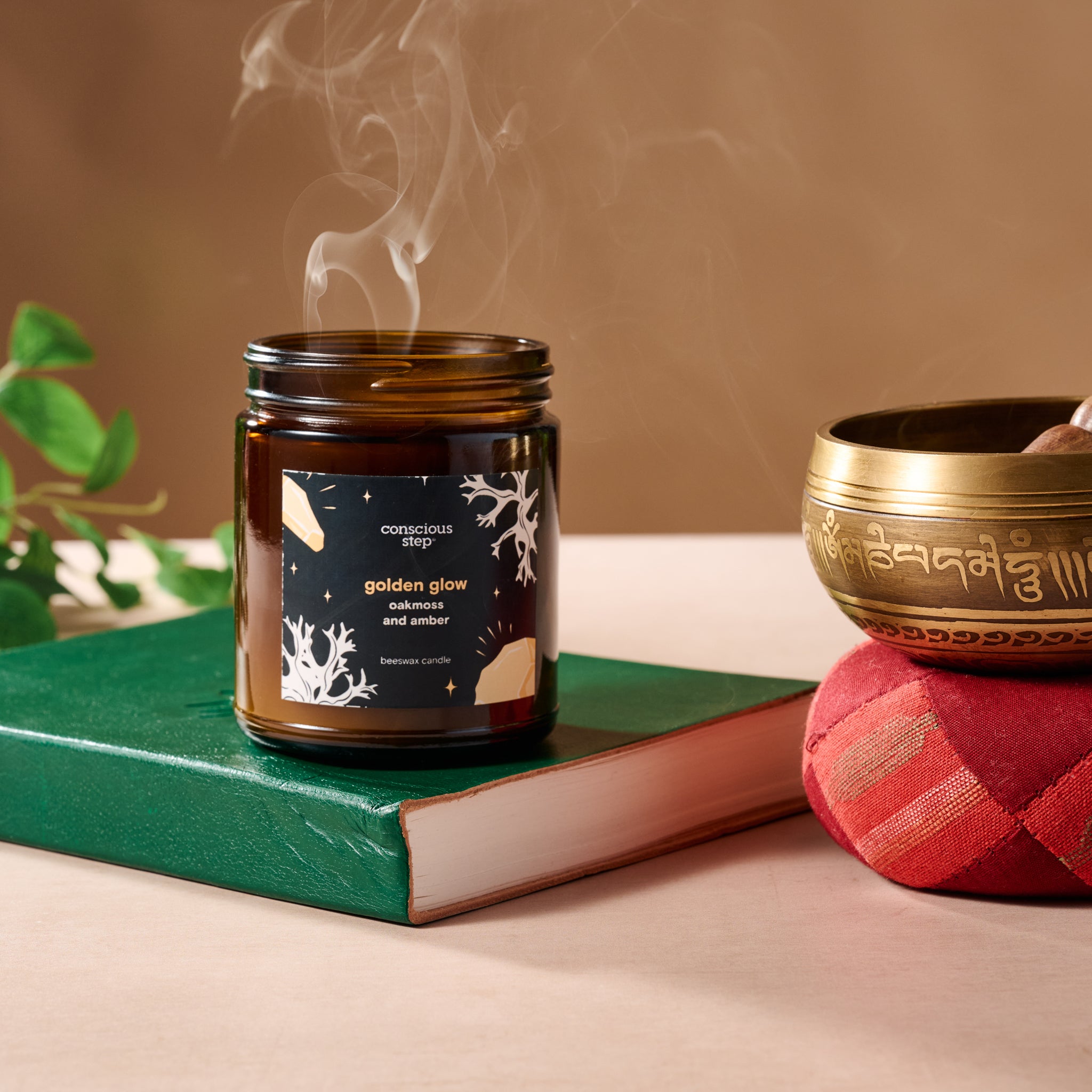 Close-up of the Golden Serenity Candle showcasing its warm glow and elegant design.