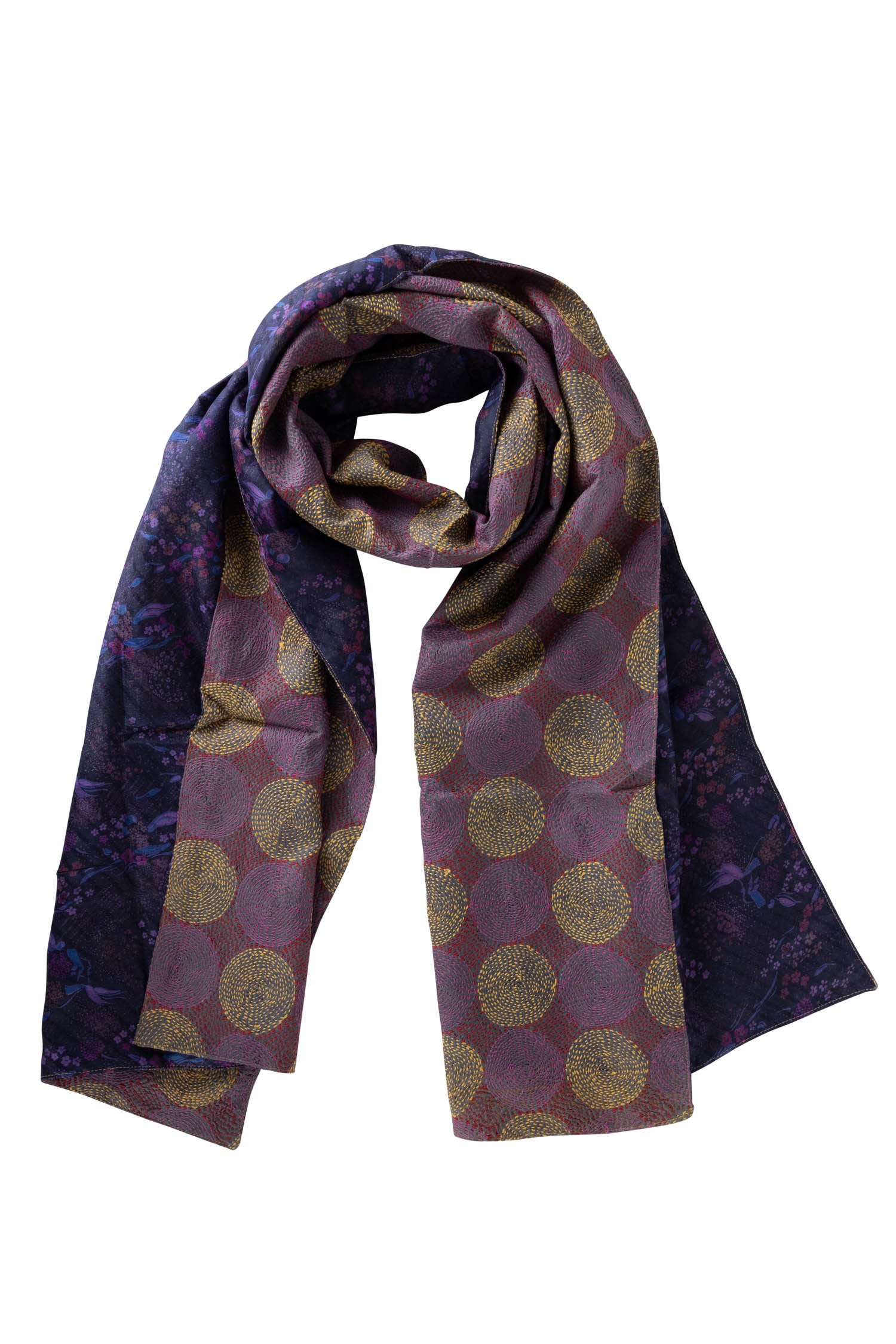 Elegant woman draped in the handmade silk scarf, demonstrating its versatility and style.