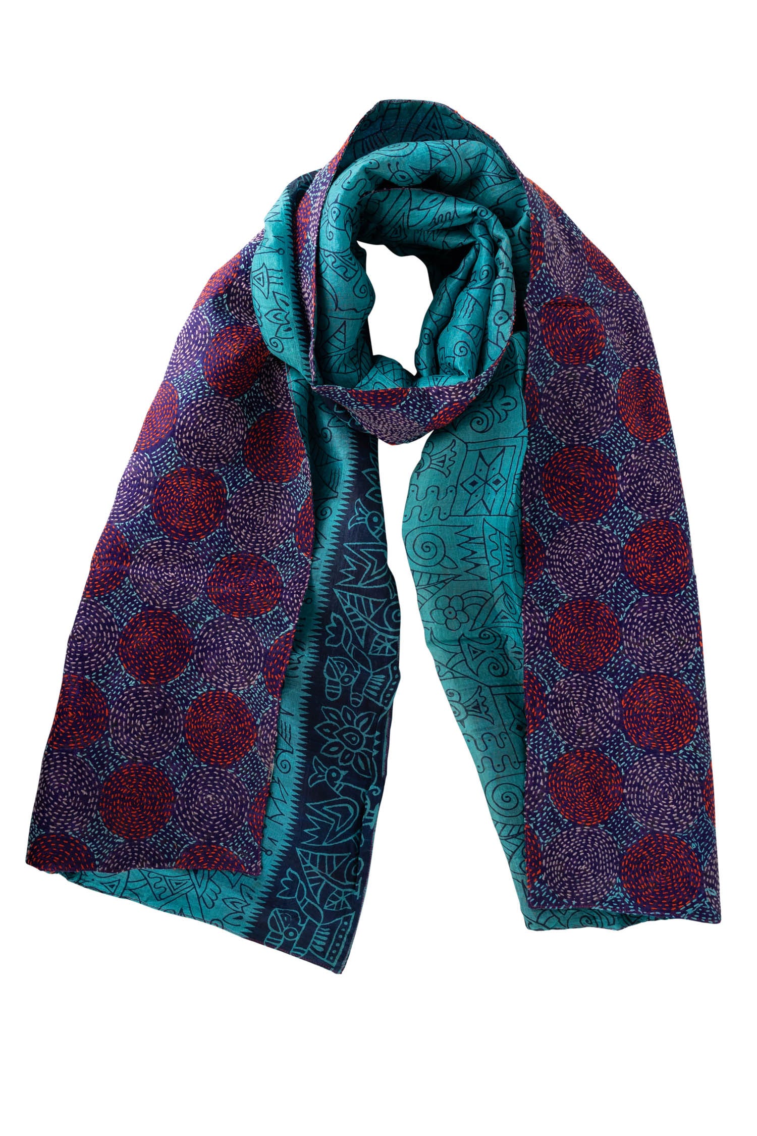 Flat lay of the silk scarf, featuring its vibrant colors and luxurious fabric against a soft background.