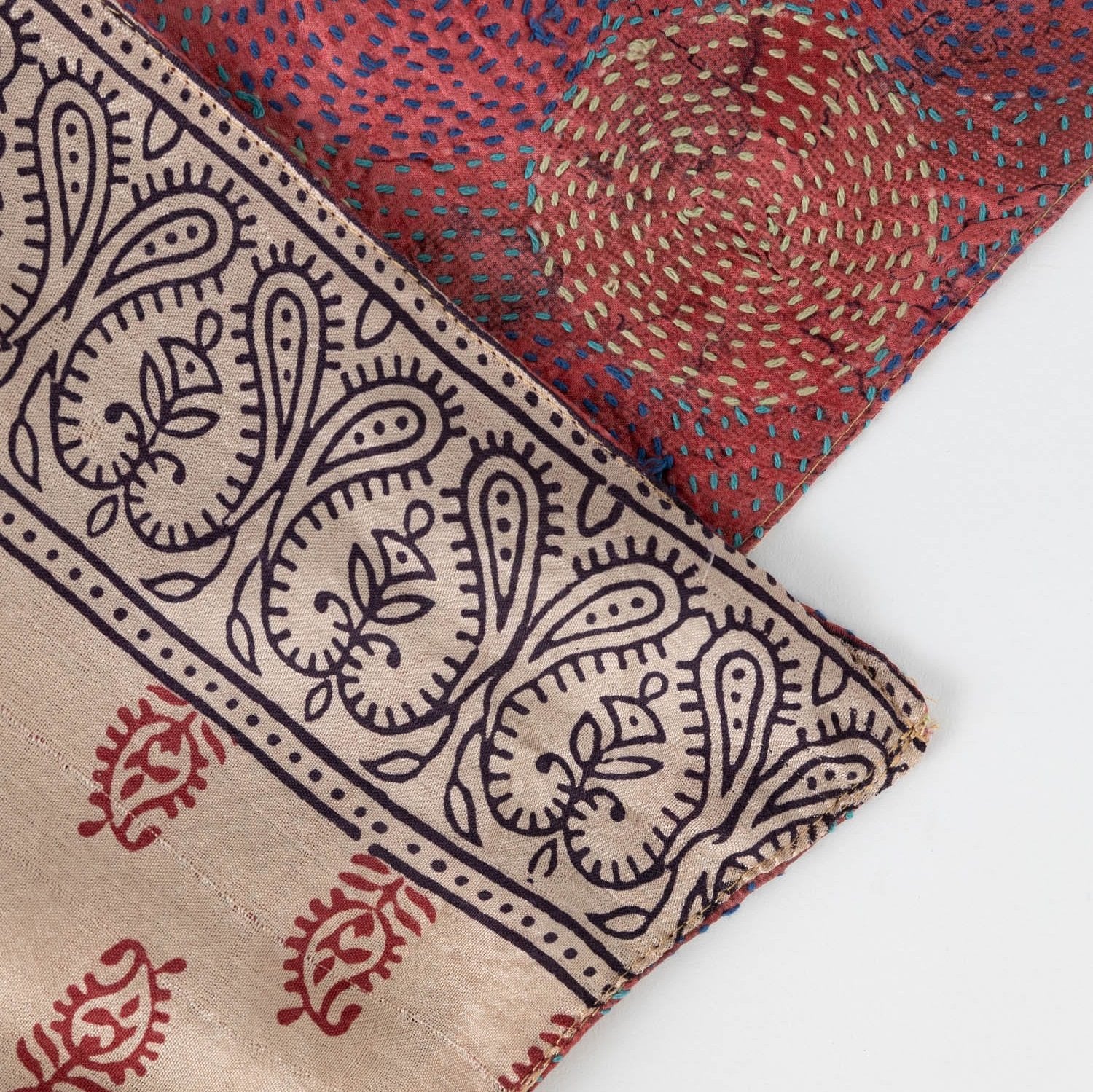 Elegant woman draped in the handmade silk scarf, demonstrating its versatility and style.