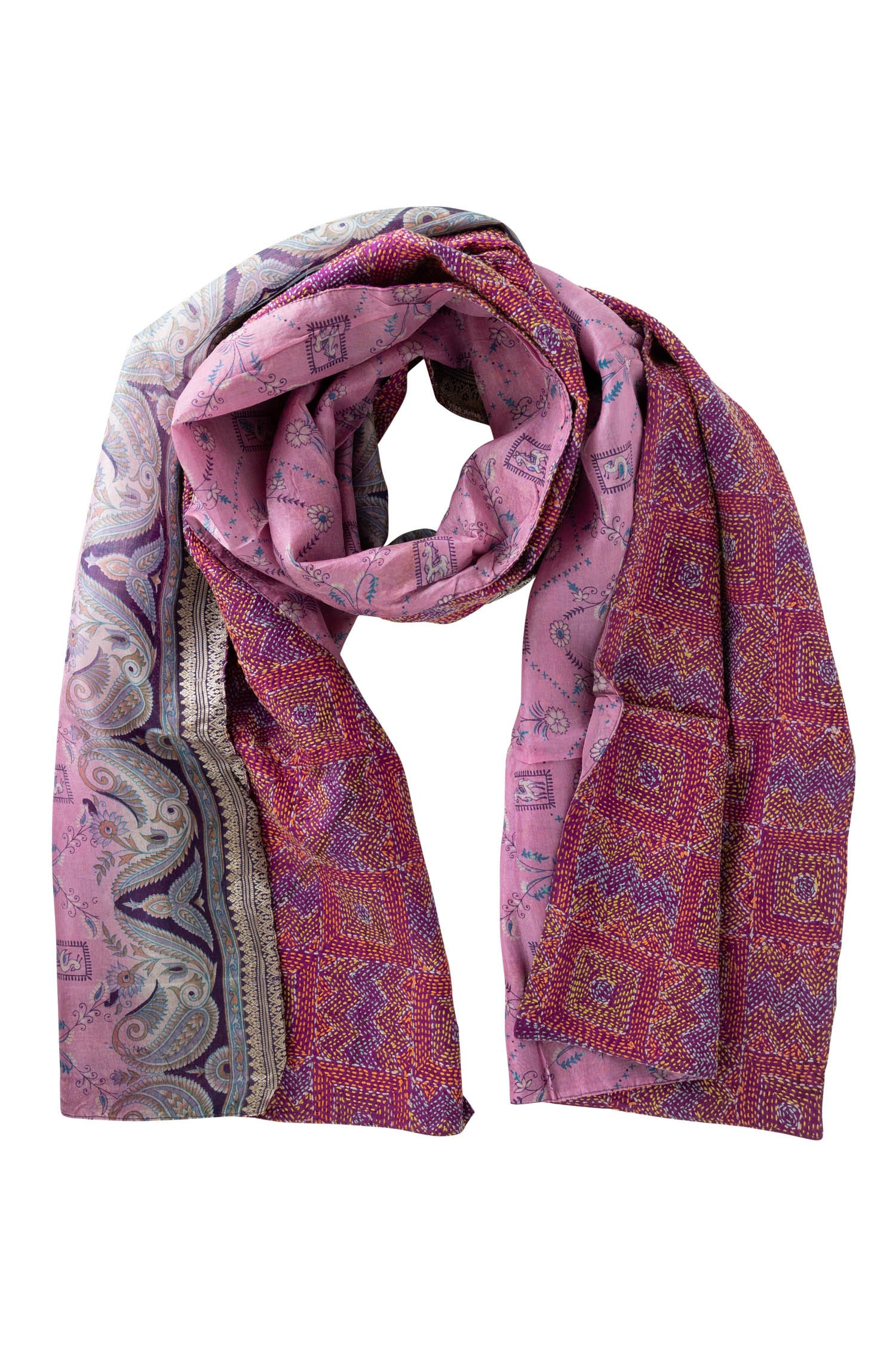 Flat lay of the silk scarf, featuring its vibrant colors and luxurious fabric against a soft background.