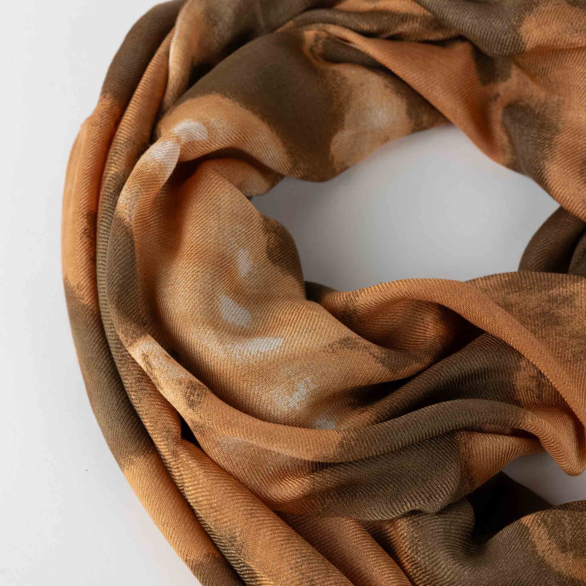 Model wearing a lightweight Bengali scarf made from sustainable materials for everyday use