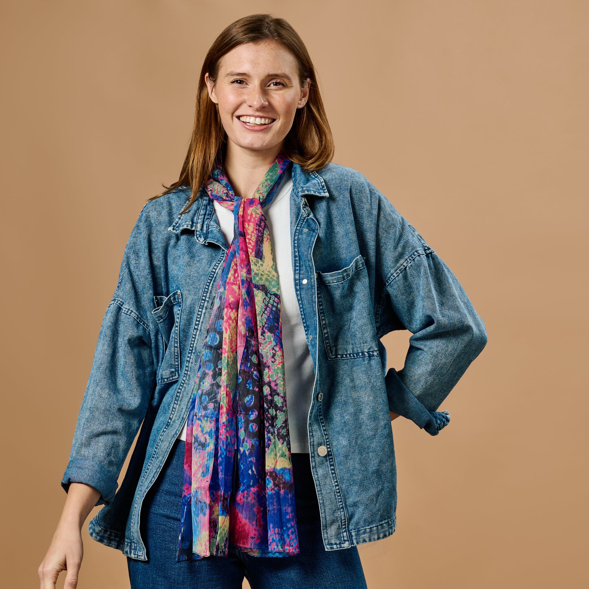 Close-up of the vibrant psychedelic chiffon scarf showcasing its colorful pattern.