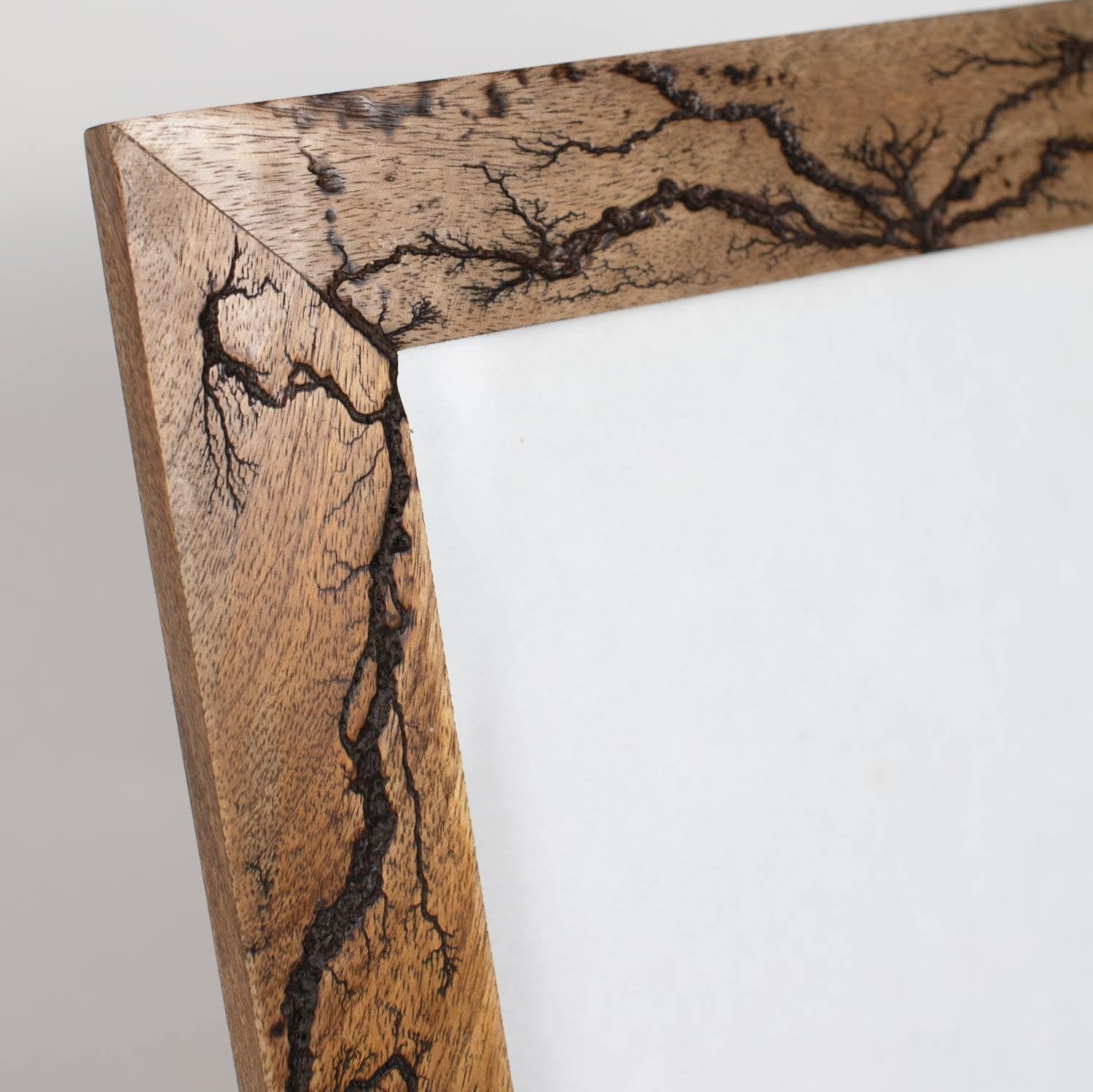 Living room decorated with a natural wooden photo frame featuring fractal patterns