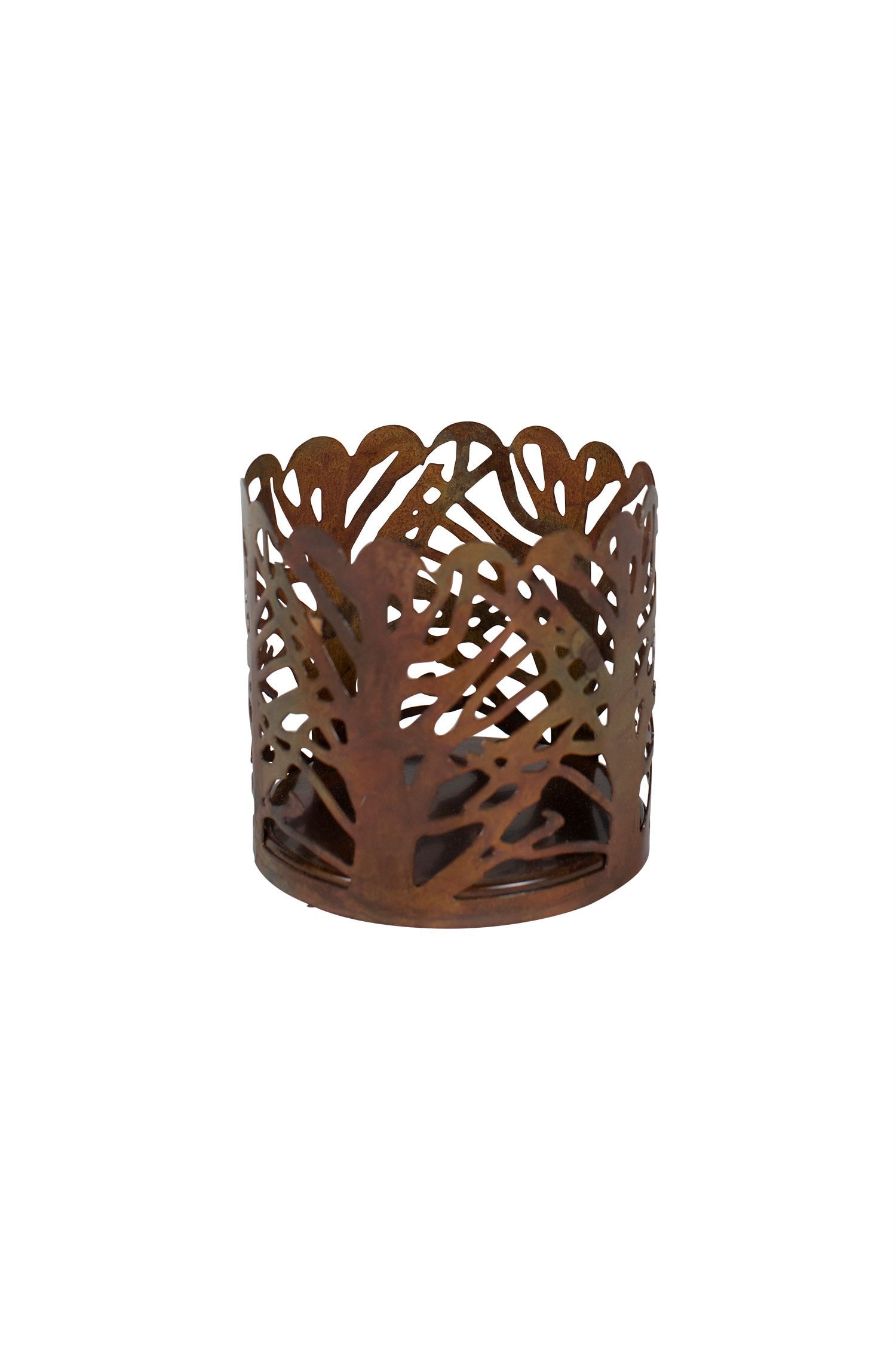 Votive candle inside the Forest Candle Holder casting a warm glow