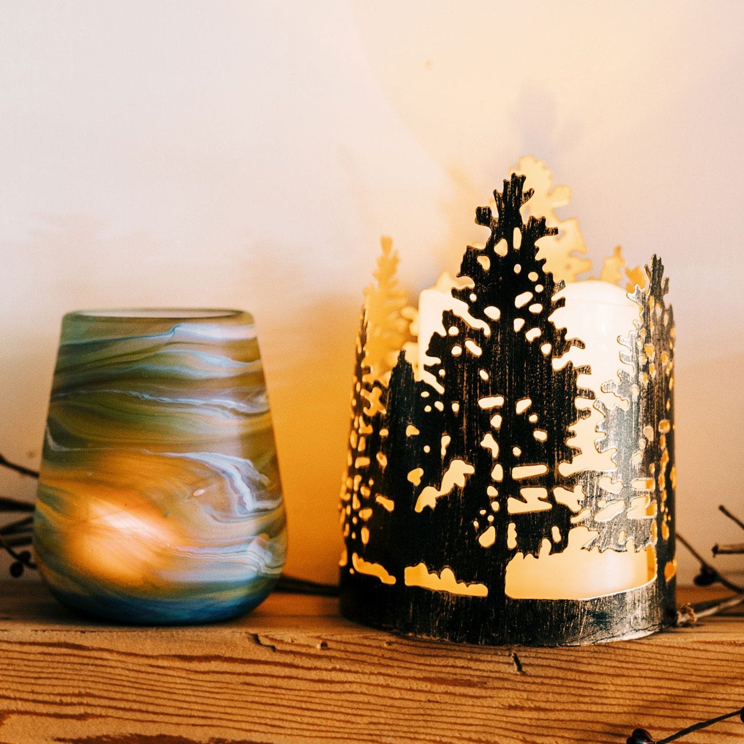Close-up of the candle holder casting beautiful tree-line shadows.