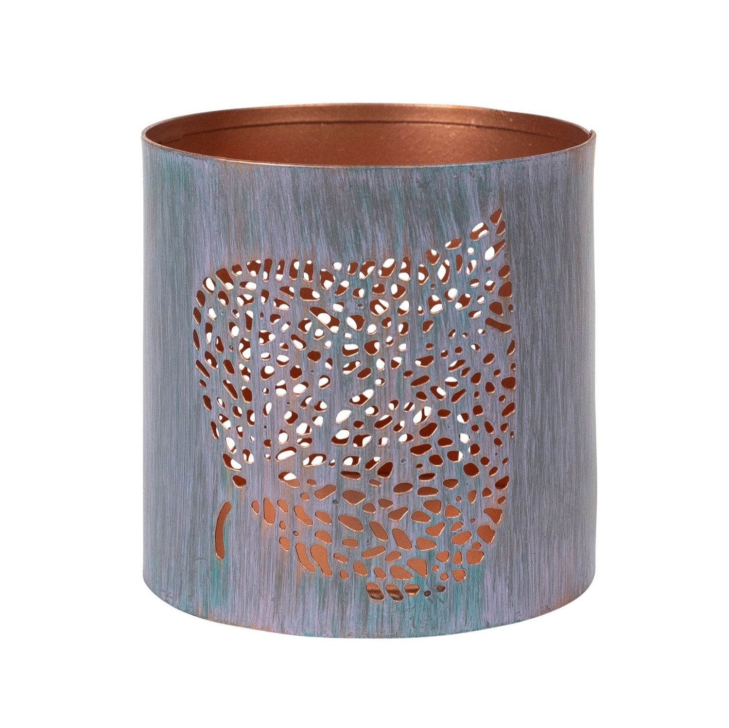 The Spiritual Bodhi Leaf Candleholder on a wooden table, creating a warm ambiance.