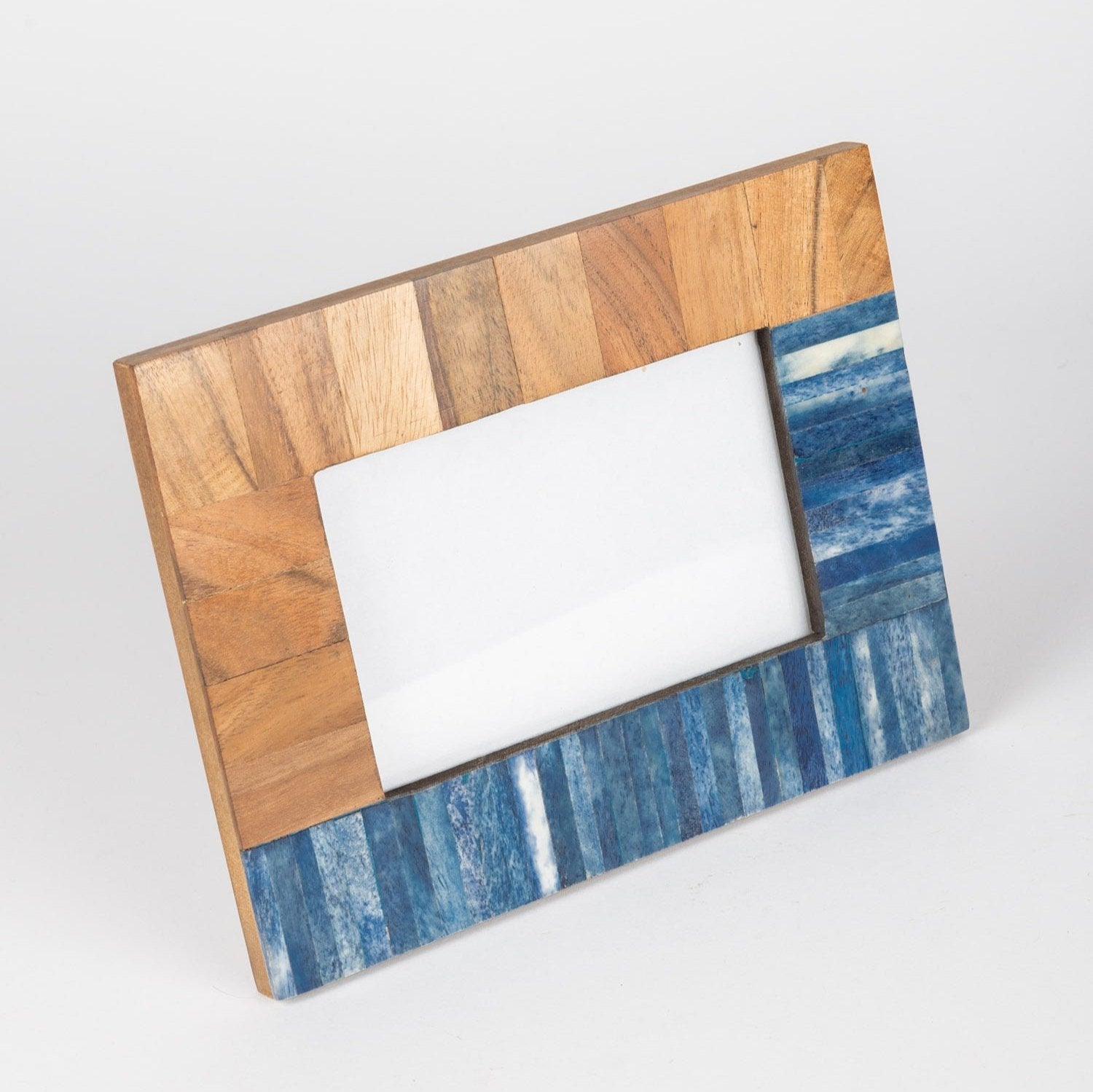 Gallery wall featuring multiple Coastal Charm frames showcasing cherished memories.