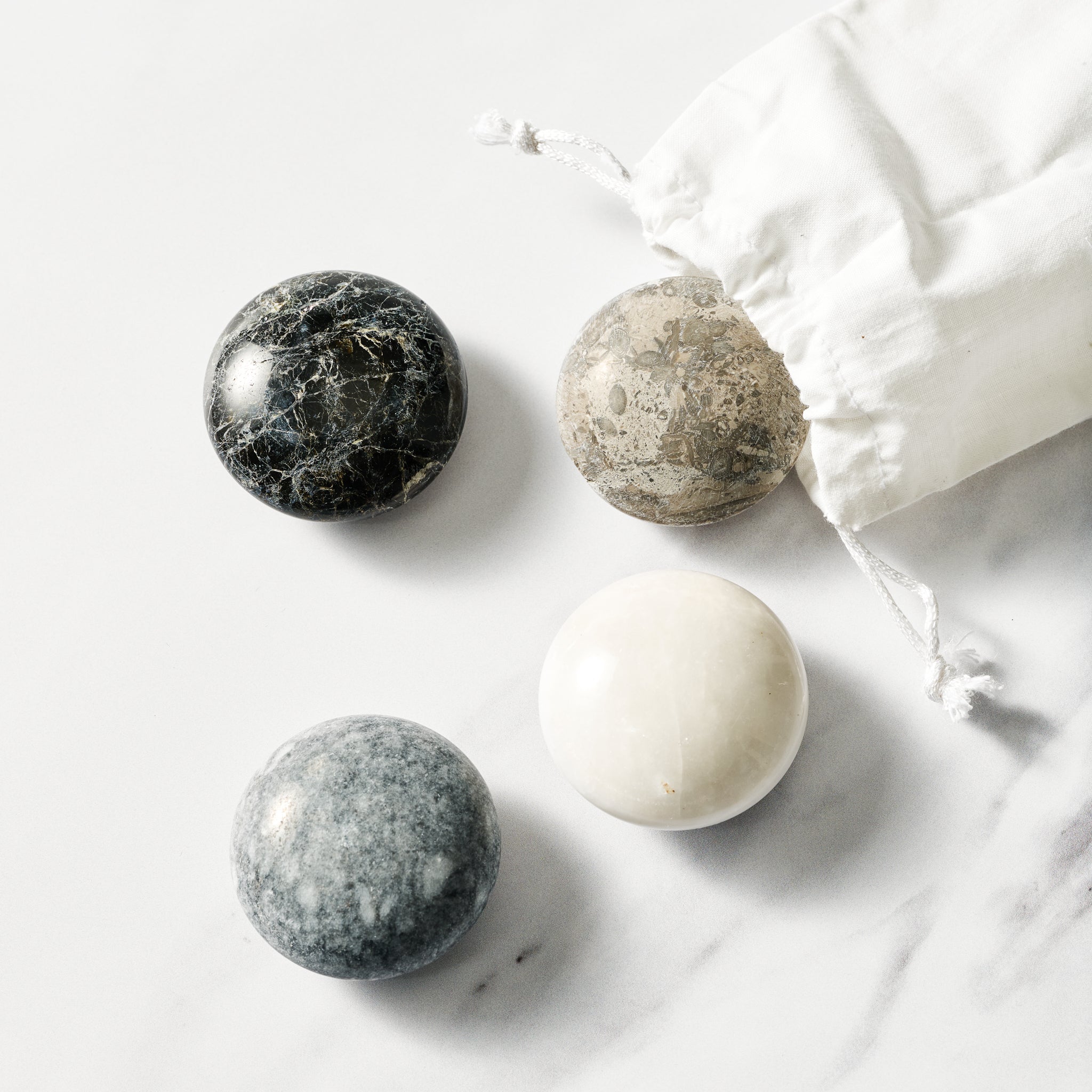 Granite whiskey rocks in a gift box, perfect for gifting and entertaining.