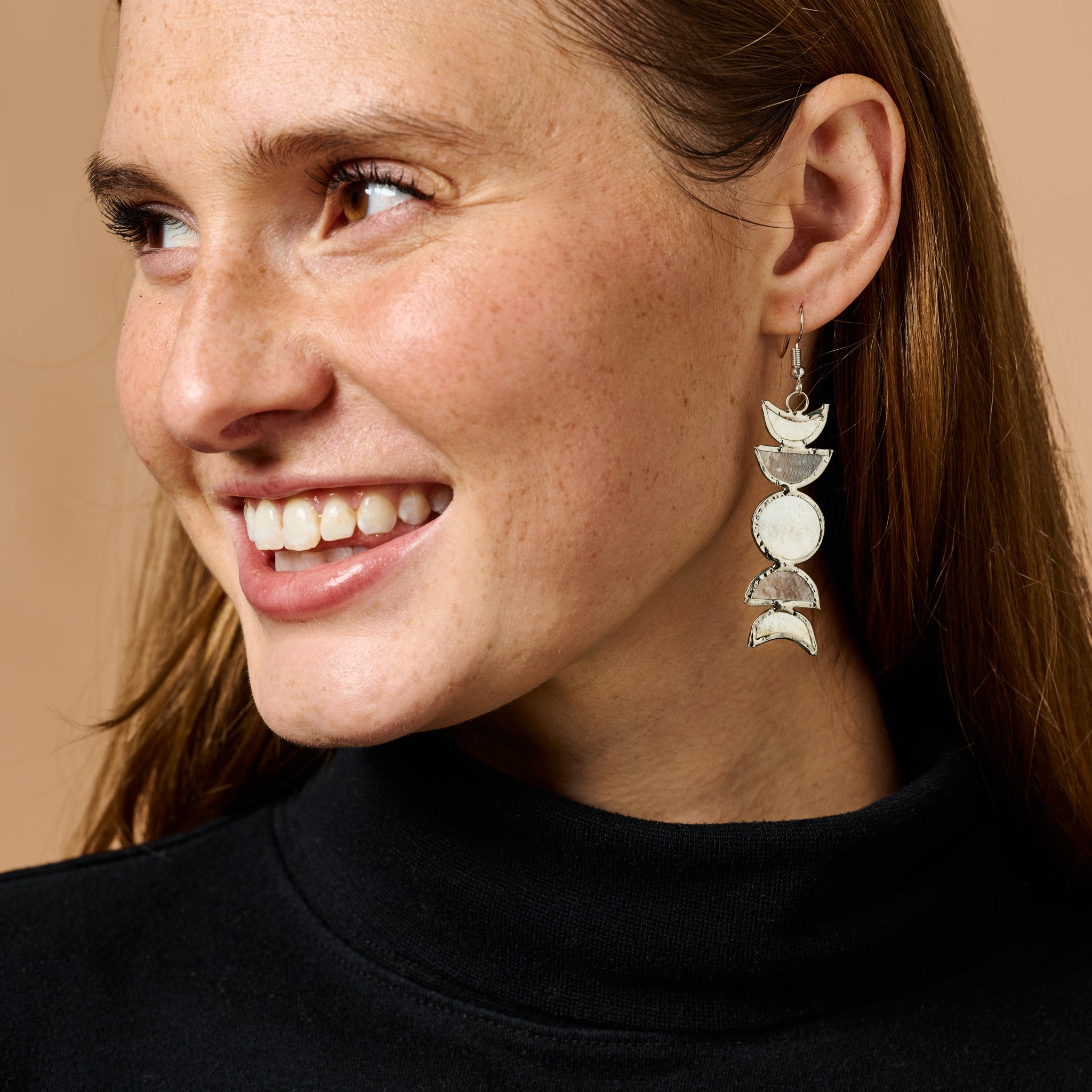 Model wearing moon earrings with casual outfit for everyday wear