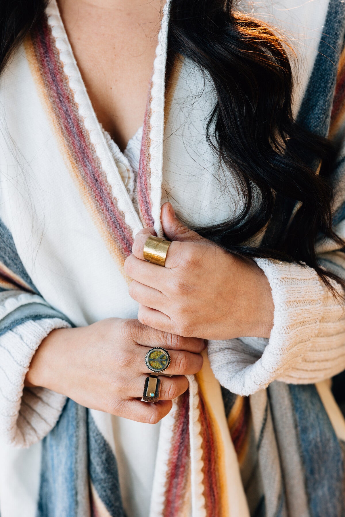 Alpaca adjustable peace sign ring worn on a hand, highlighting its fit
