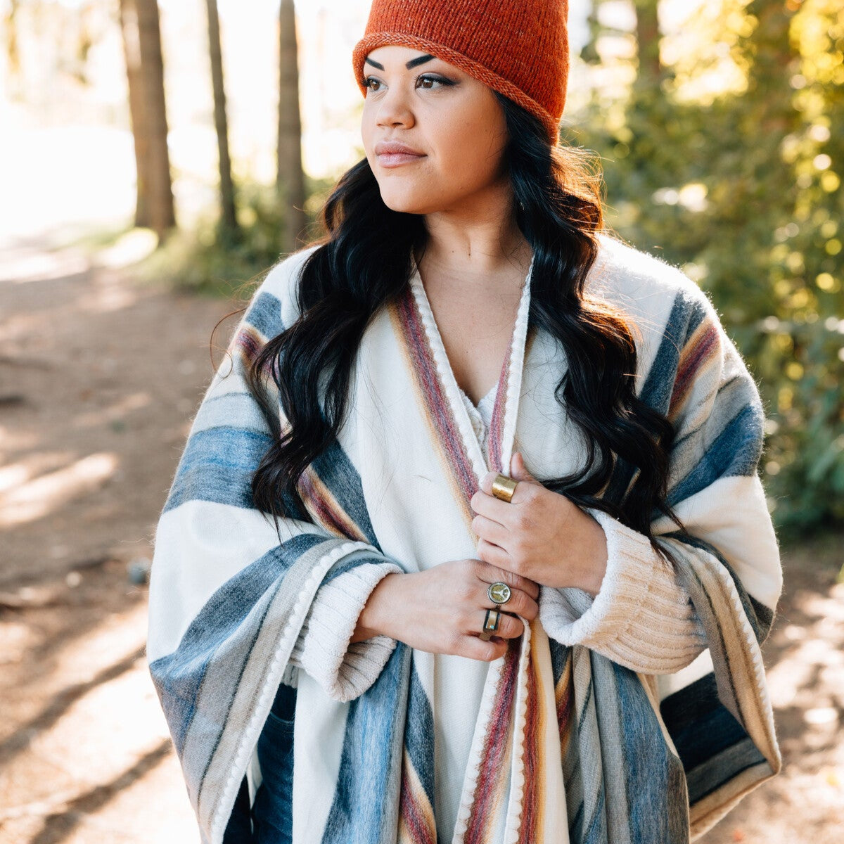 Back angle of Ecuador poncho showing intricate traditional design