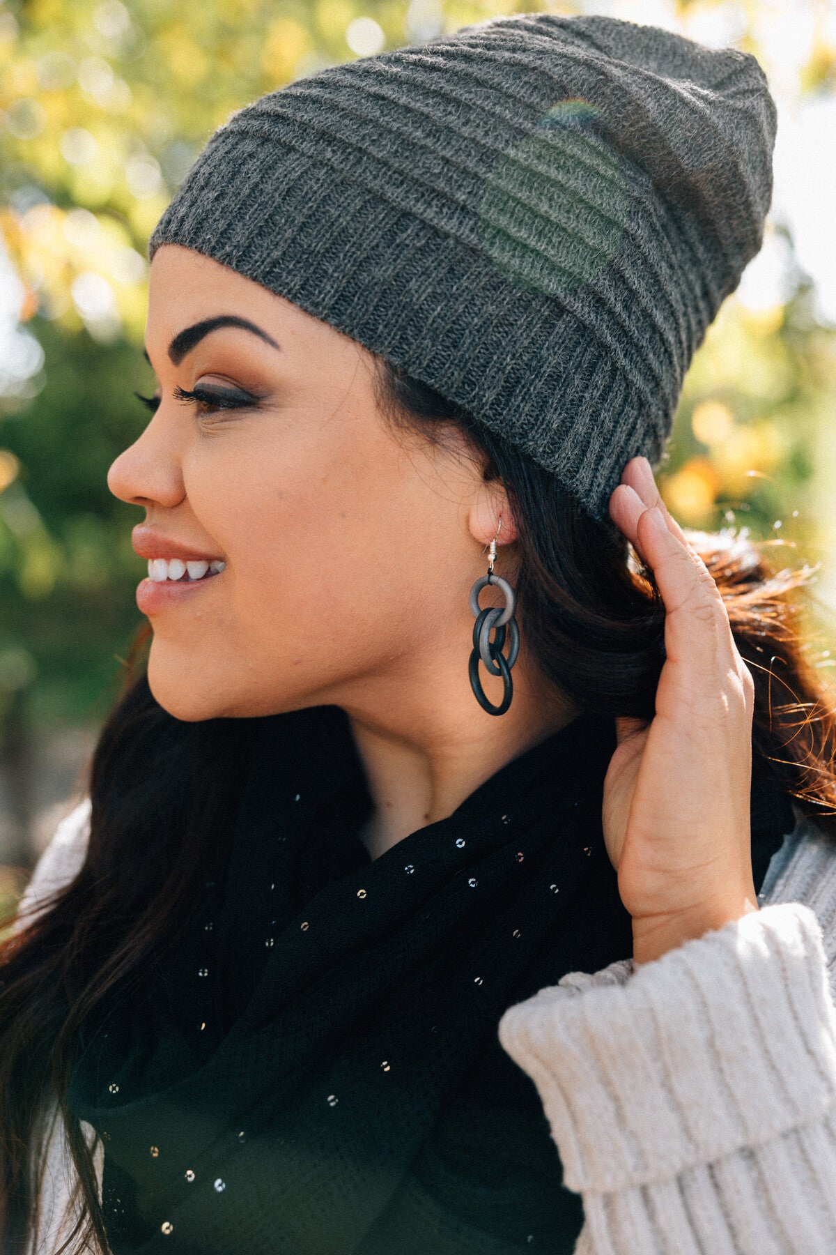 Eco-Chic Stormcloud Tagua Earrings displayed on a natural background, emphasizing their eco-friendly materials.