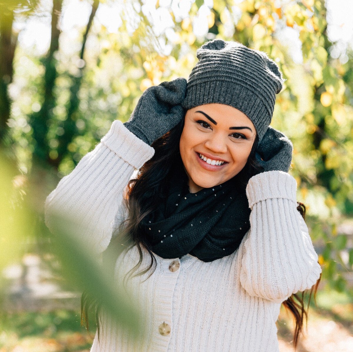 Artisan-crafted wool mittens in a neutral tone, showcasing quality craftsmanship.