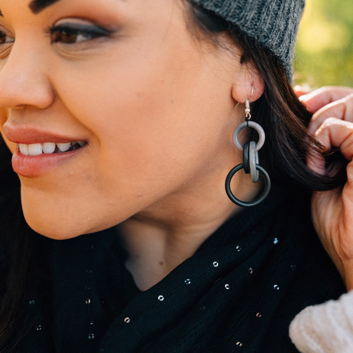 Close-up of the Eco-Chic Stormcloud Tagua Earrings showcasing their intricate design and colors.