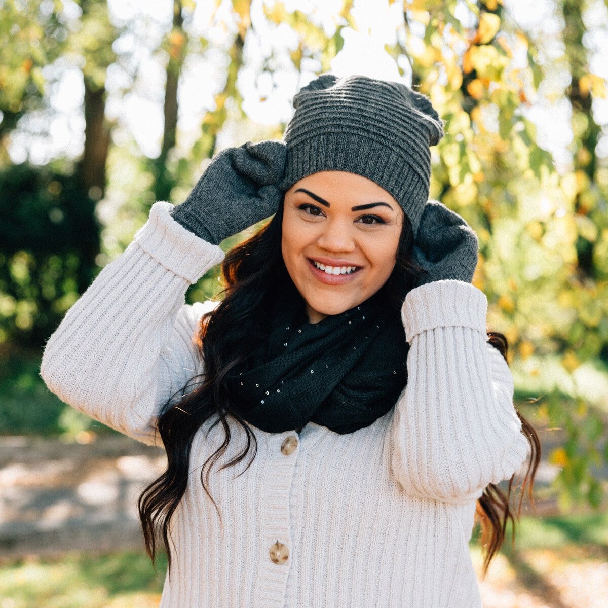 Model wearing the stylish slouchy hat for men and women in a winter setting.