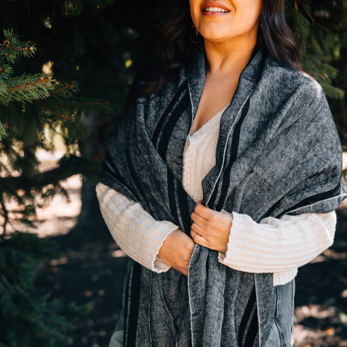 Chic Evening Fog Handcrafted Scarf draped elegantly over a chair.