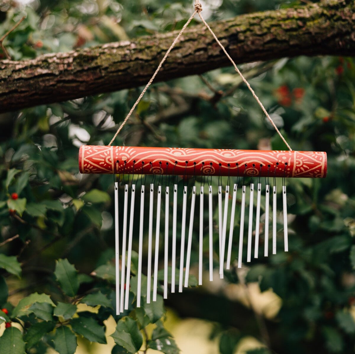 EcoHarmony Wind Chimes close-up showing the 21 pipes and craftsmanship.