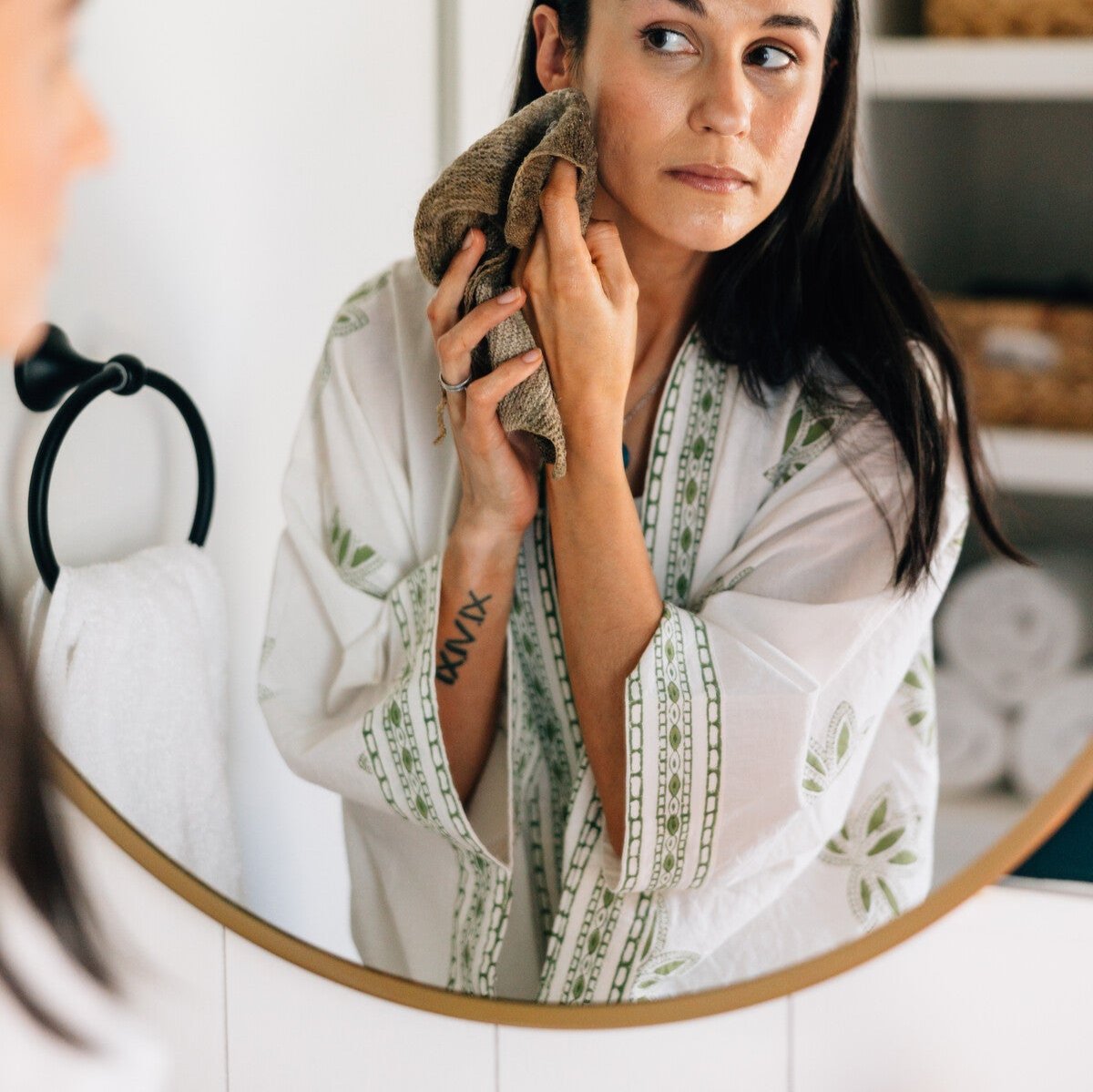 Model wearing the luxury sun-dried cotton bathrobe in a cozy home setting