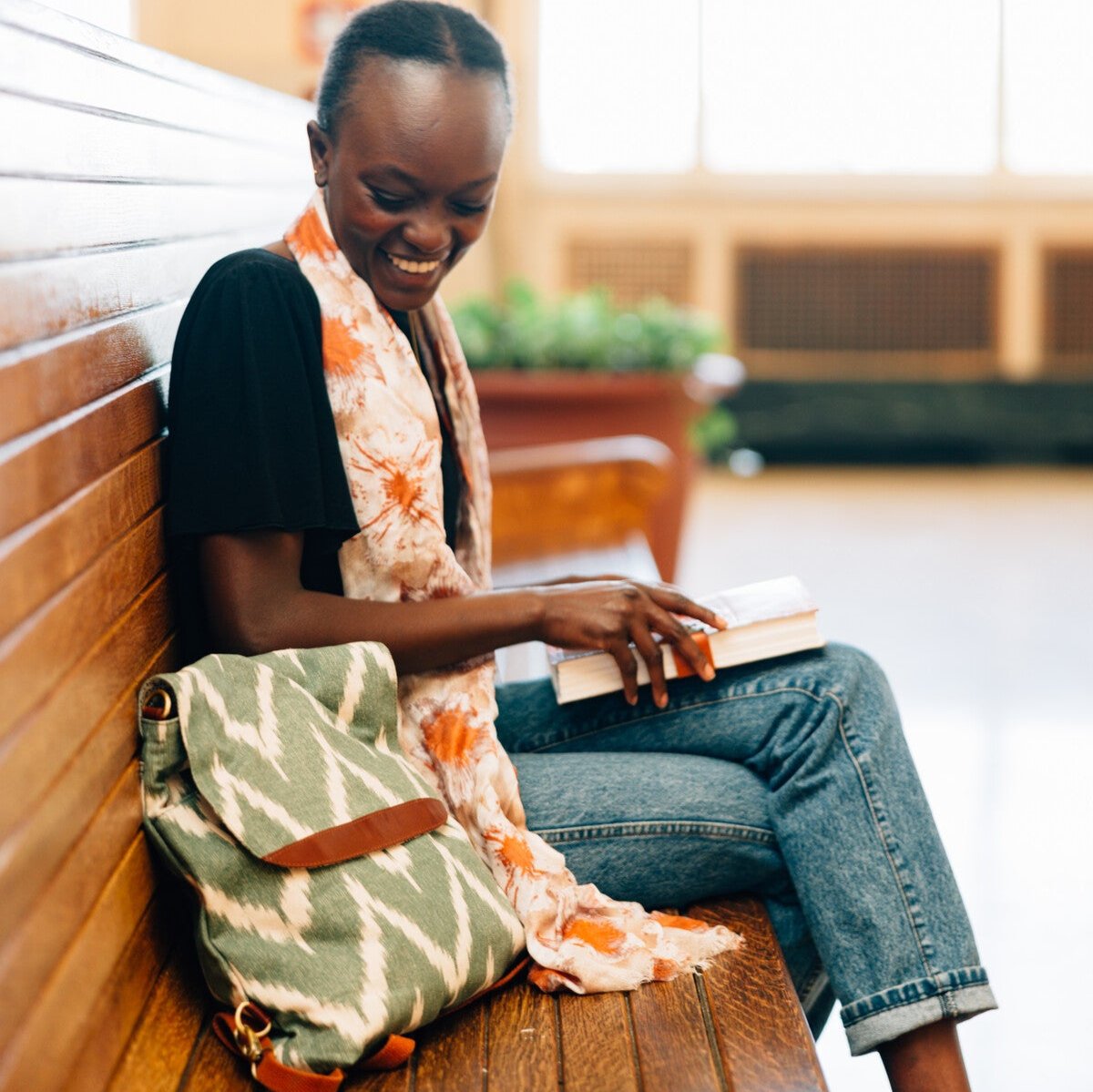 Red Yarrow Fashion Scarf draped over a casual outfit, showcasing its versatility.