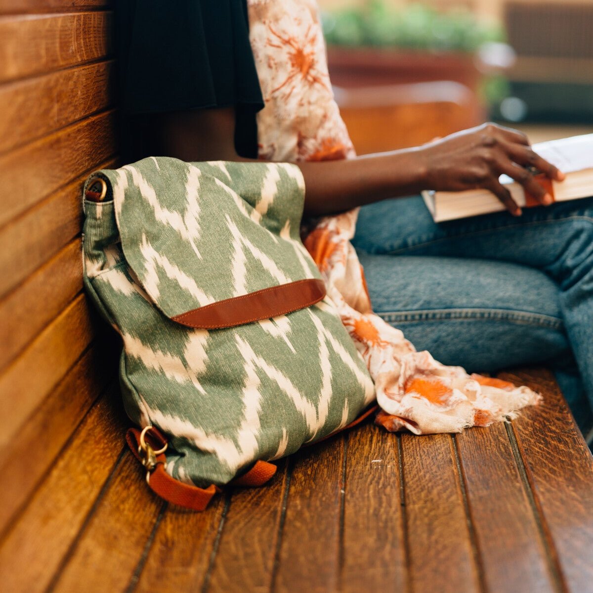 Close-up of the ikat pattern and leather accent on the Chic Ikat Backpack.