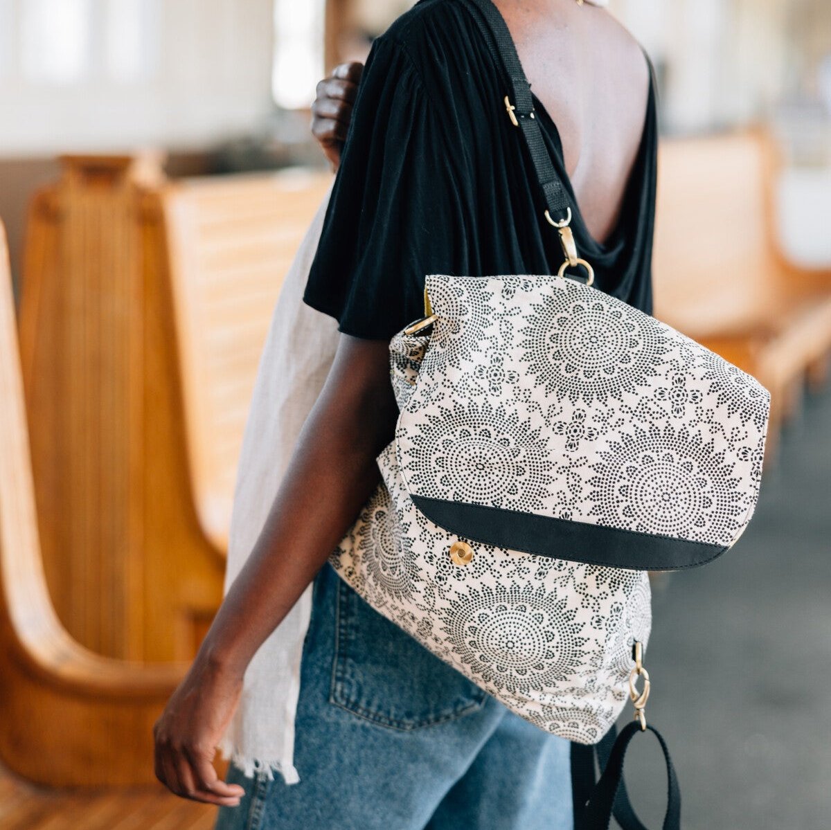 Crossbody style of the Travel Mandala Backpack, demonstrating its versatility and fashion-forward design.
