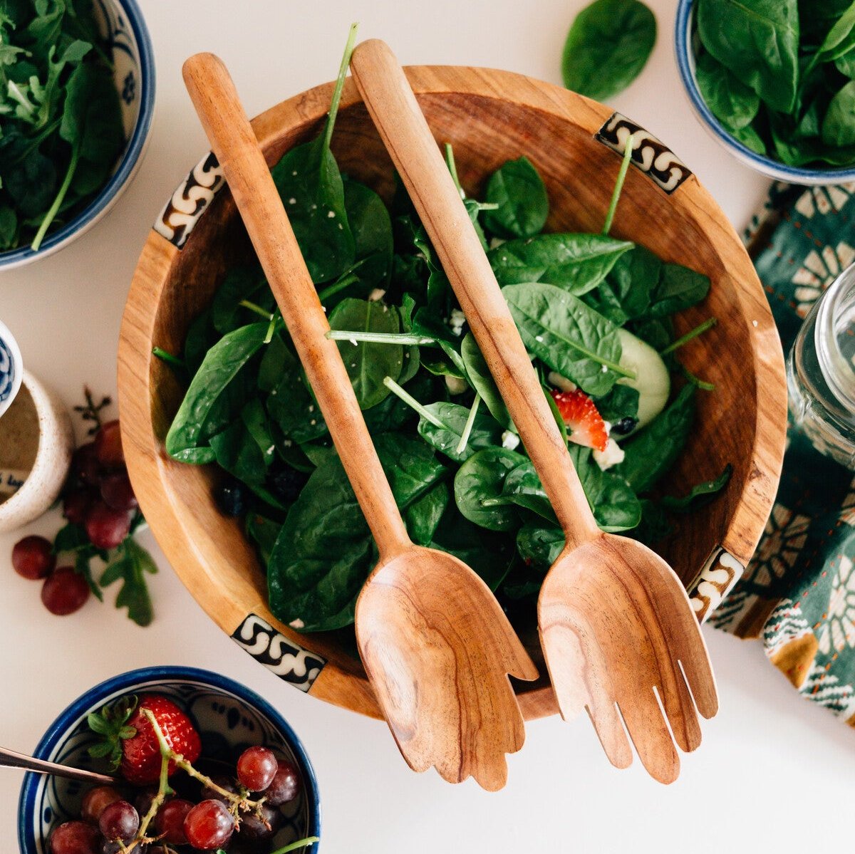 Elegant handcrafted salad servers, showcasing the natural beauty of neem wood.