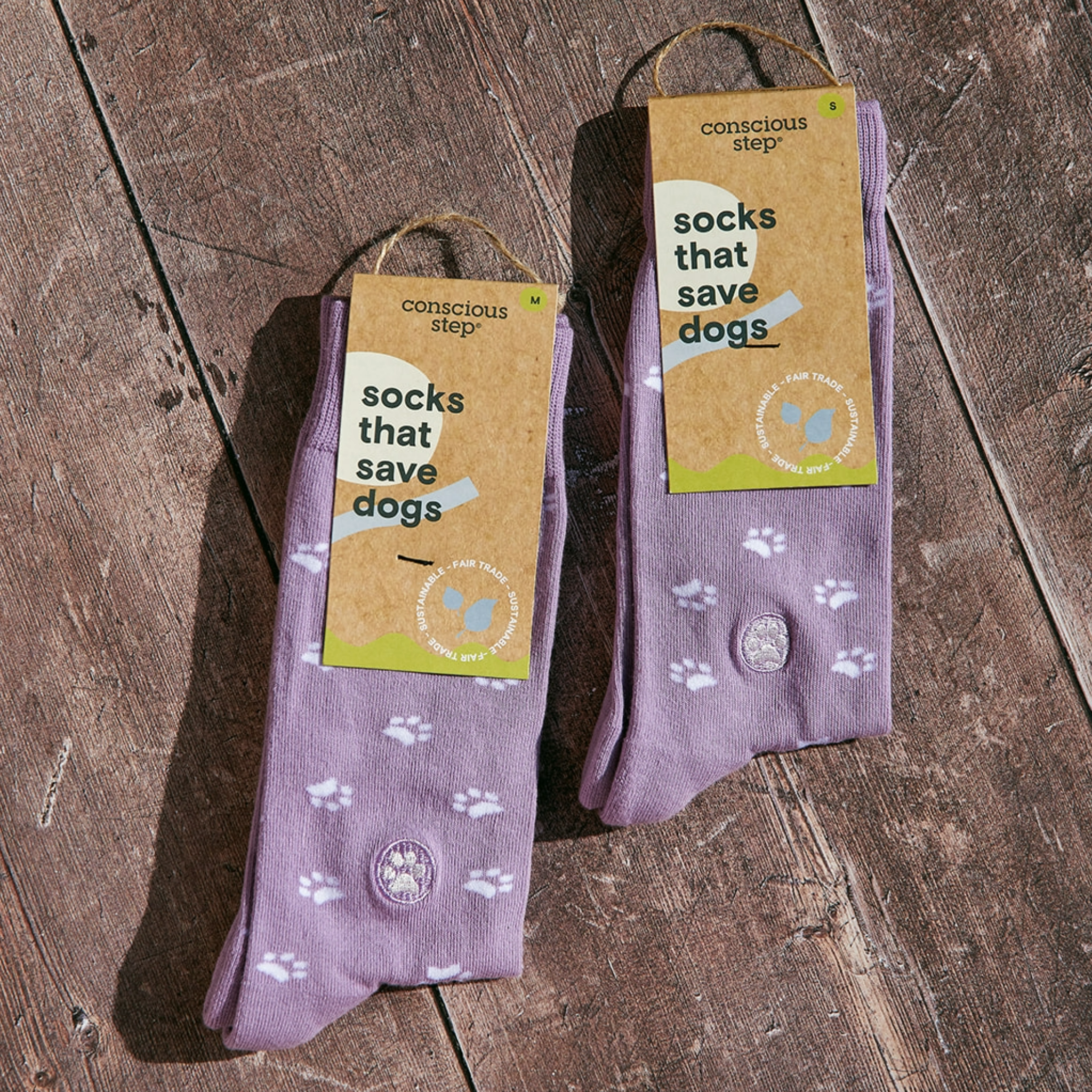 Stylish pet apparel: dog socks with adorable paw prints.